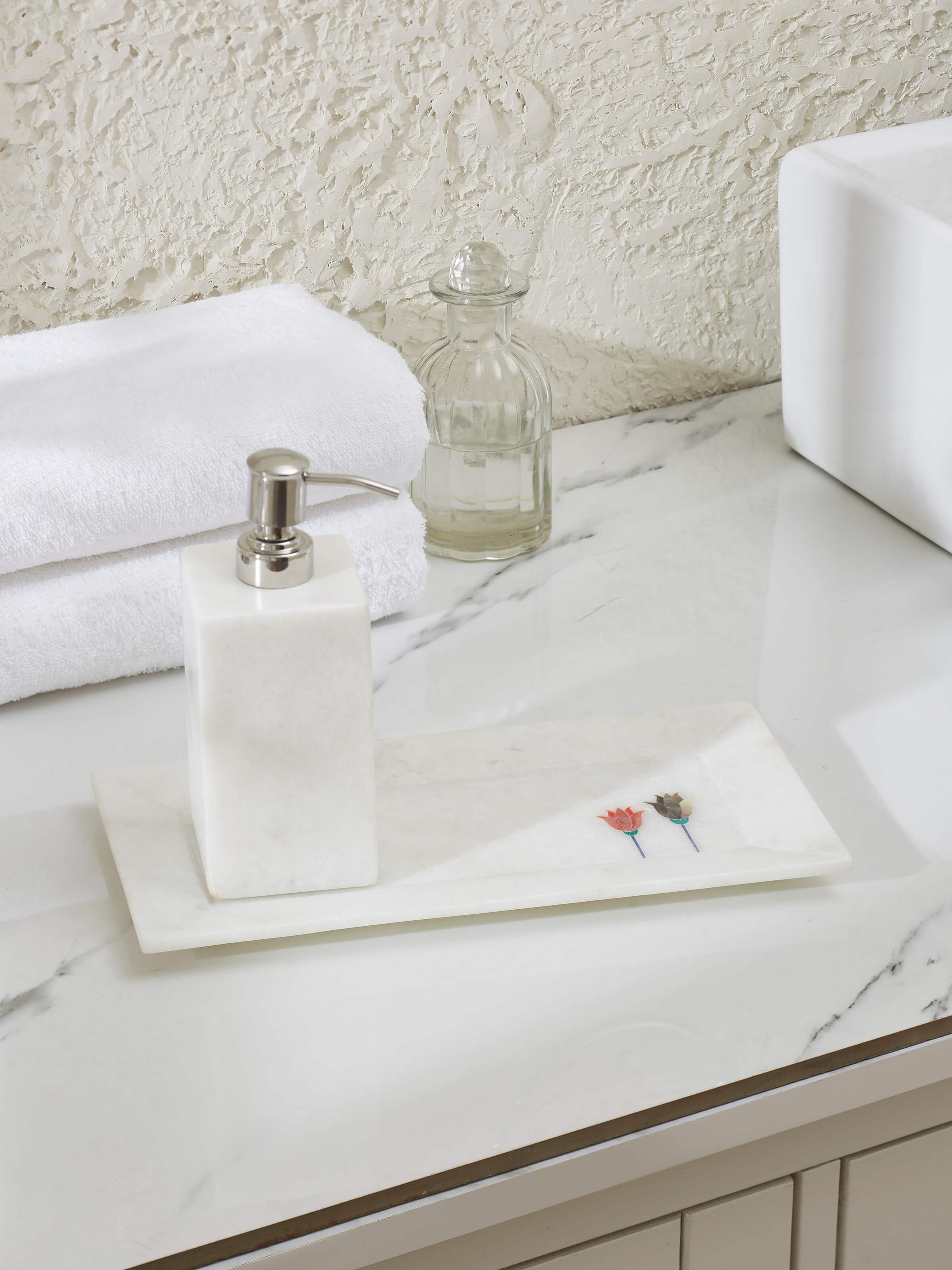 Side view of Glossy Carved Ambaji White Marble Bath Tray highlighting detailed carvings and sleek surface