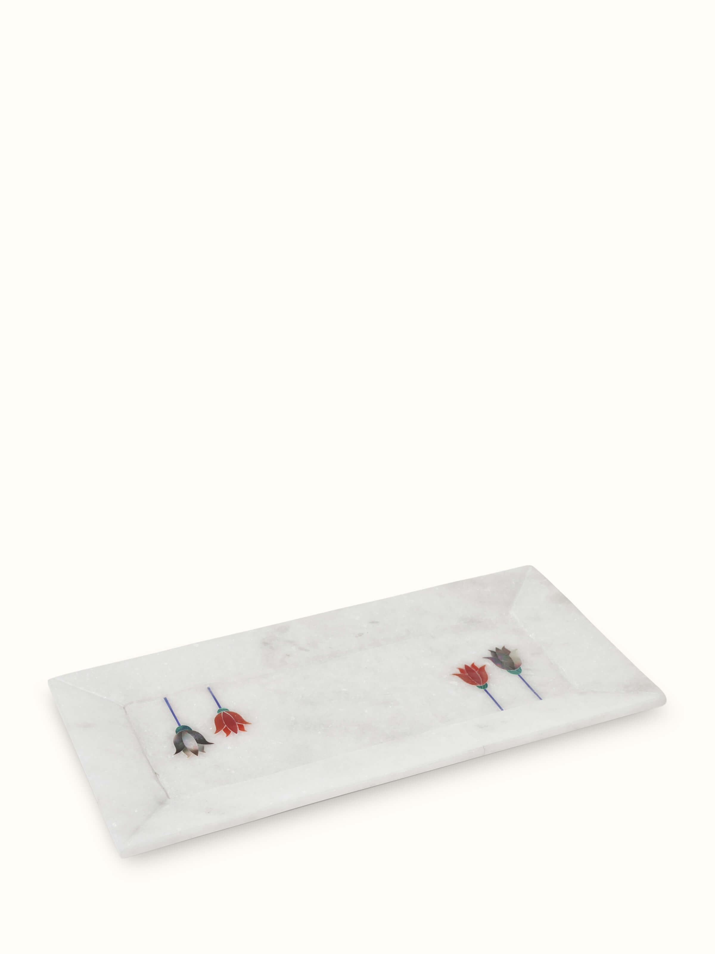 Angled view of Glossy Carved Ambaji White Marble Bath Tray showcasing the detailed craftsmanship and elegant design