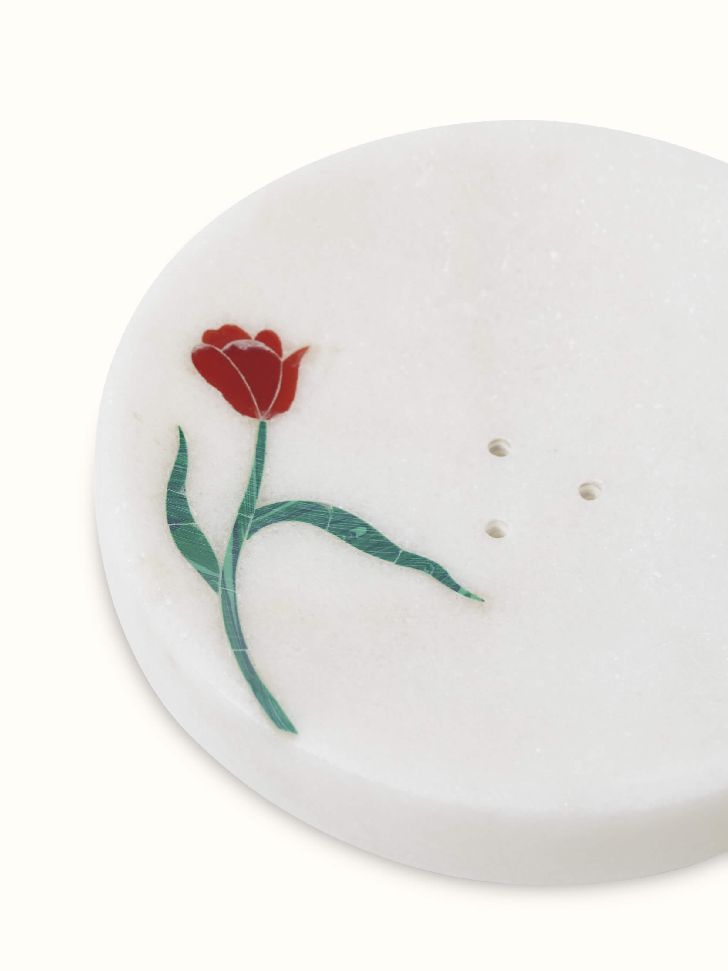 Close-up of Carved Ambaji white marble rose soap dish emphasizing elegant rose design.
