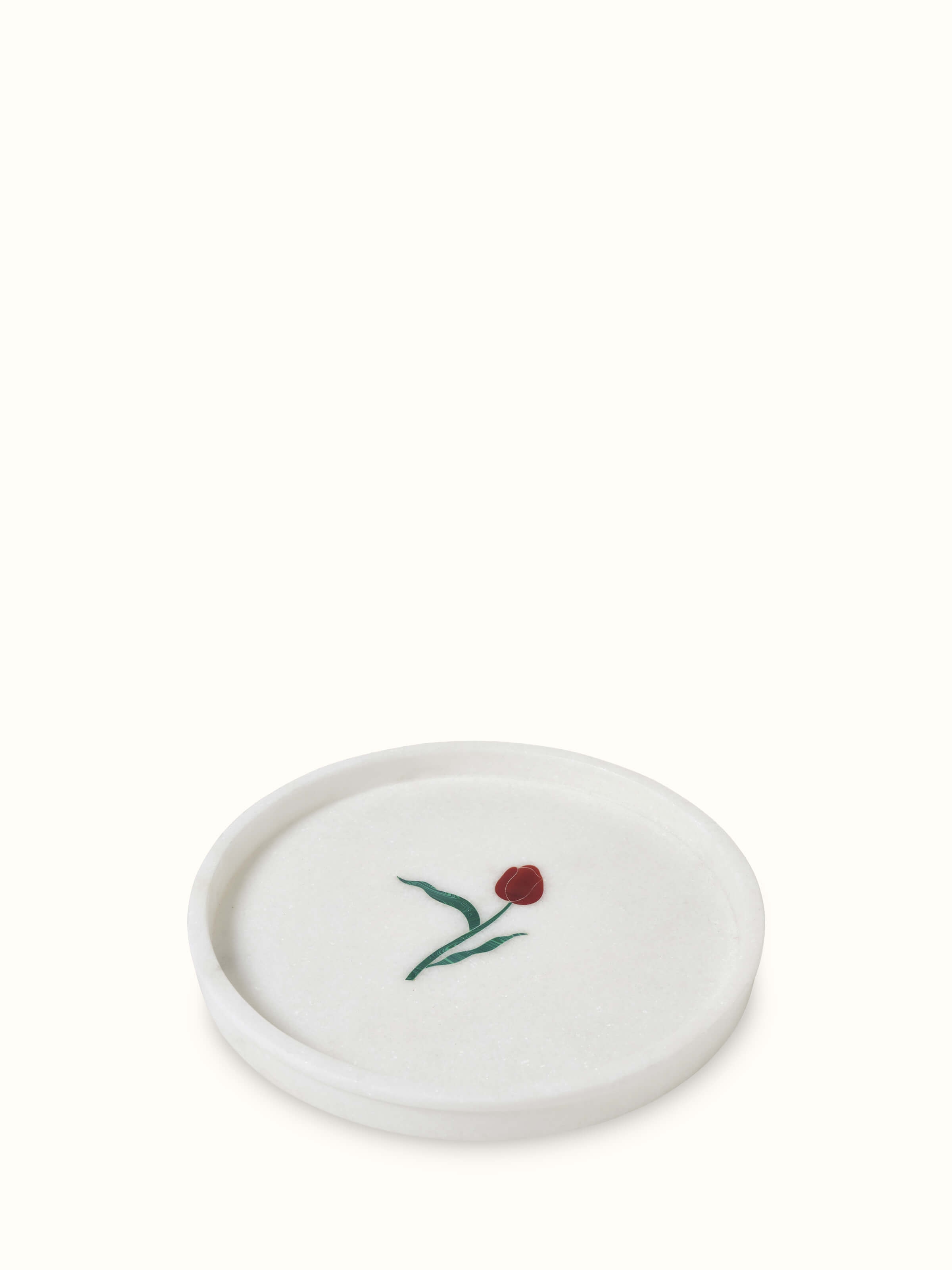 Front view of white carved Ambaji marble bath tray with detailed craftsmanship