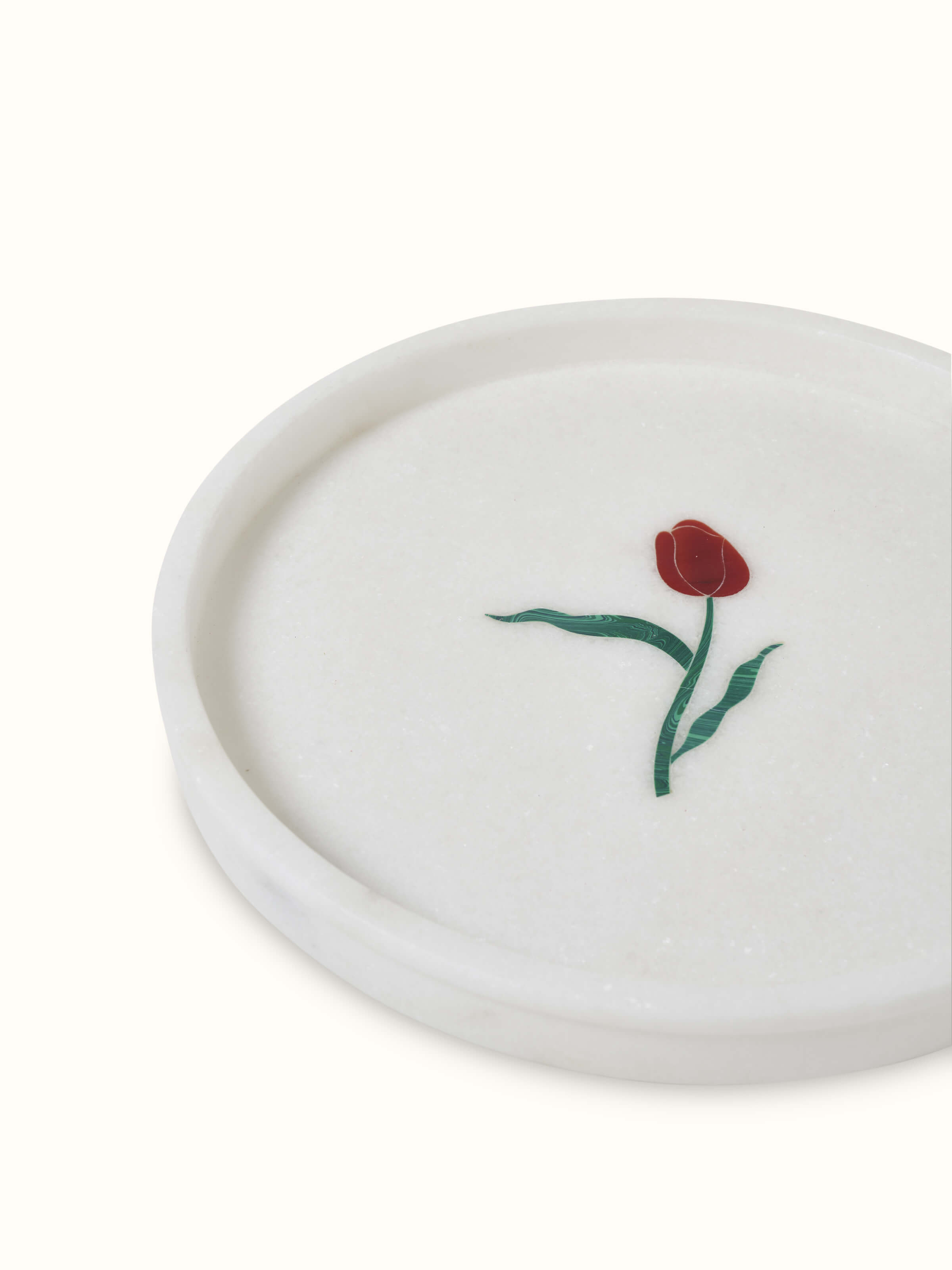 Top view of white carved Ambaji marble bath tray showcasing fine details