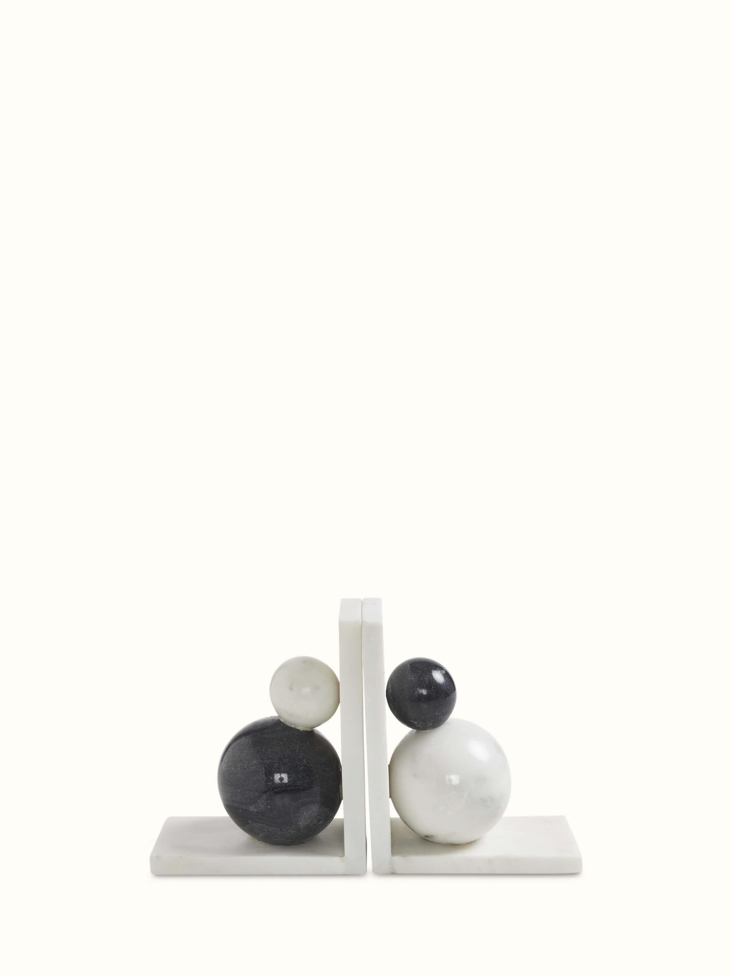 Front view of carved marble bookend in white color displaying its elegant and polished finish