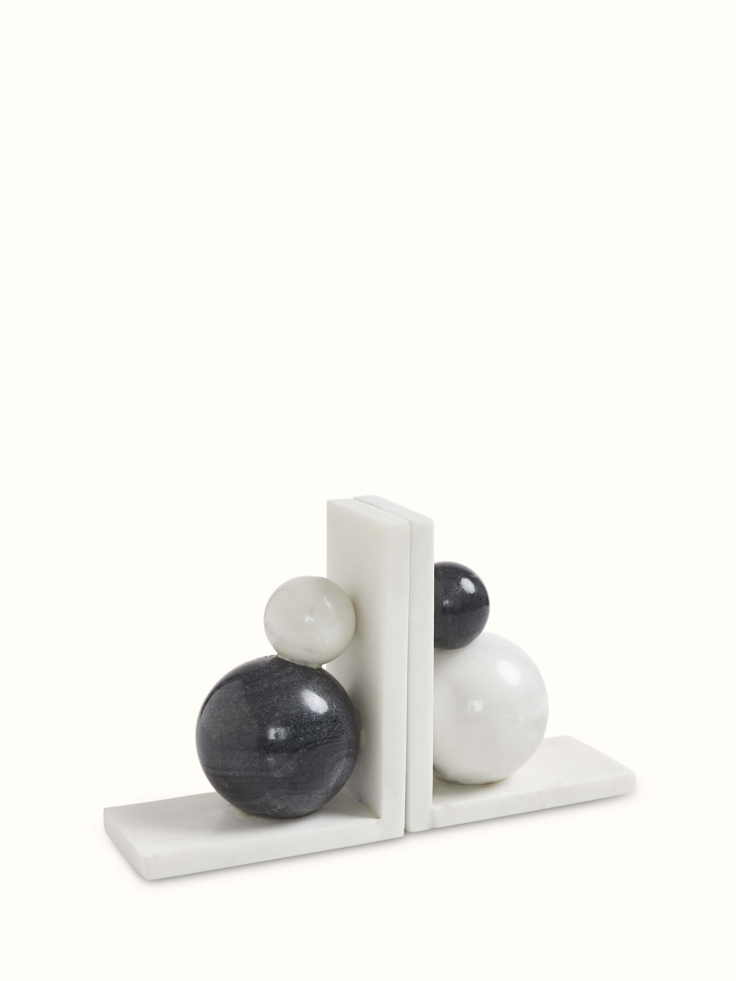 Detailed view of carved marble bookend in white color showcasing the elegant craftsmanship