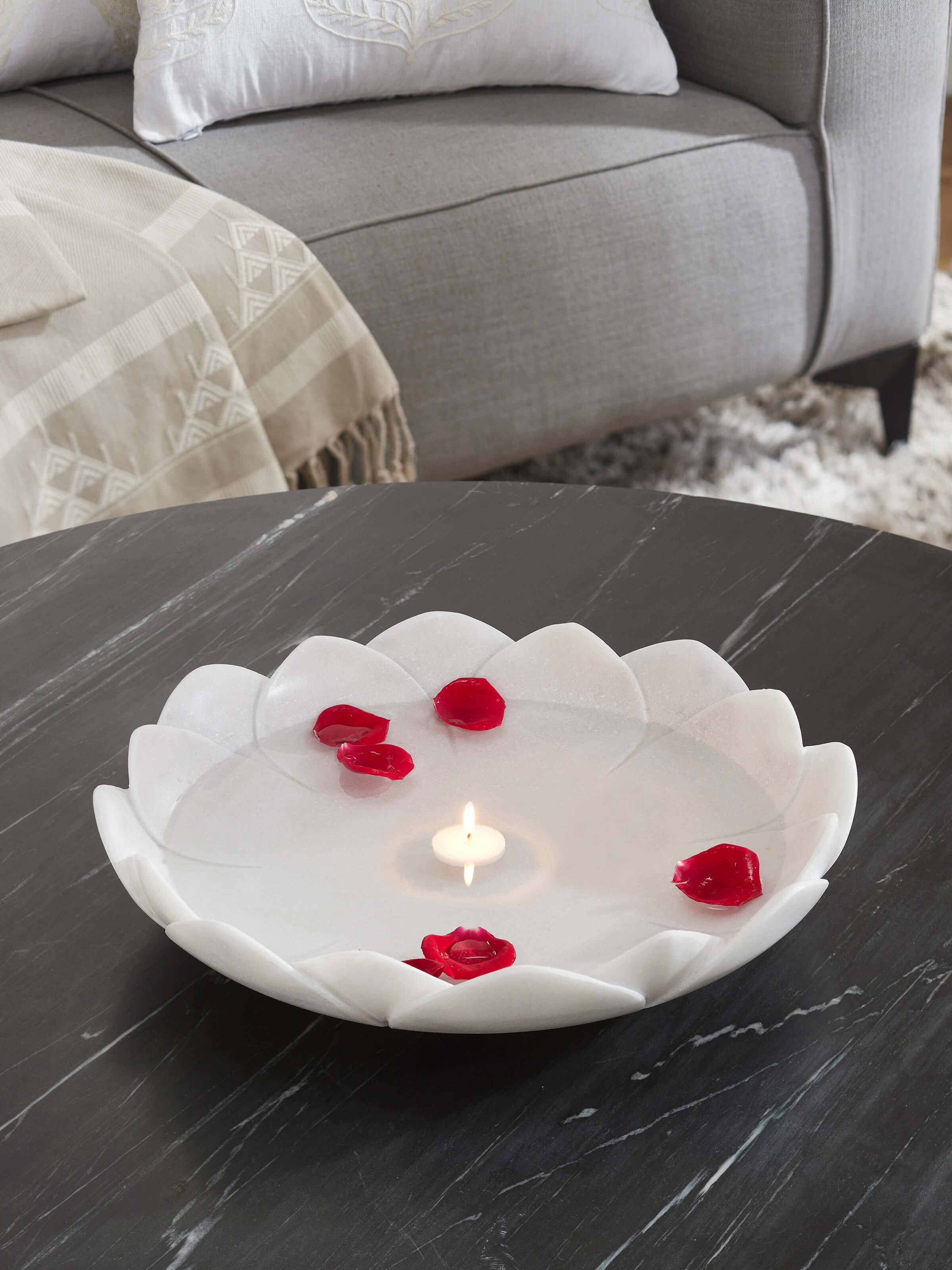 Side view of Flat Carved Marble Urli highlighting the depth and marble carving details.