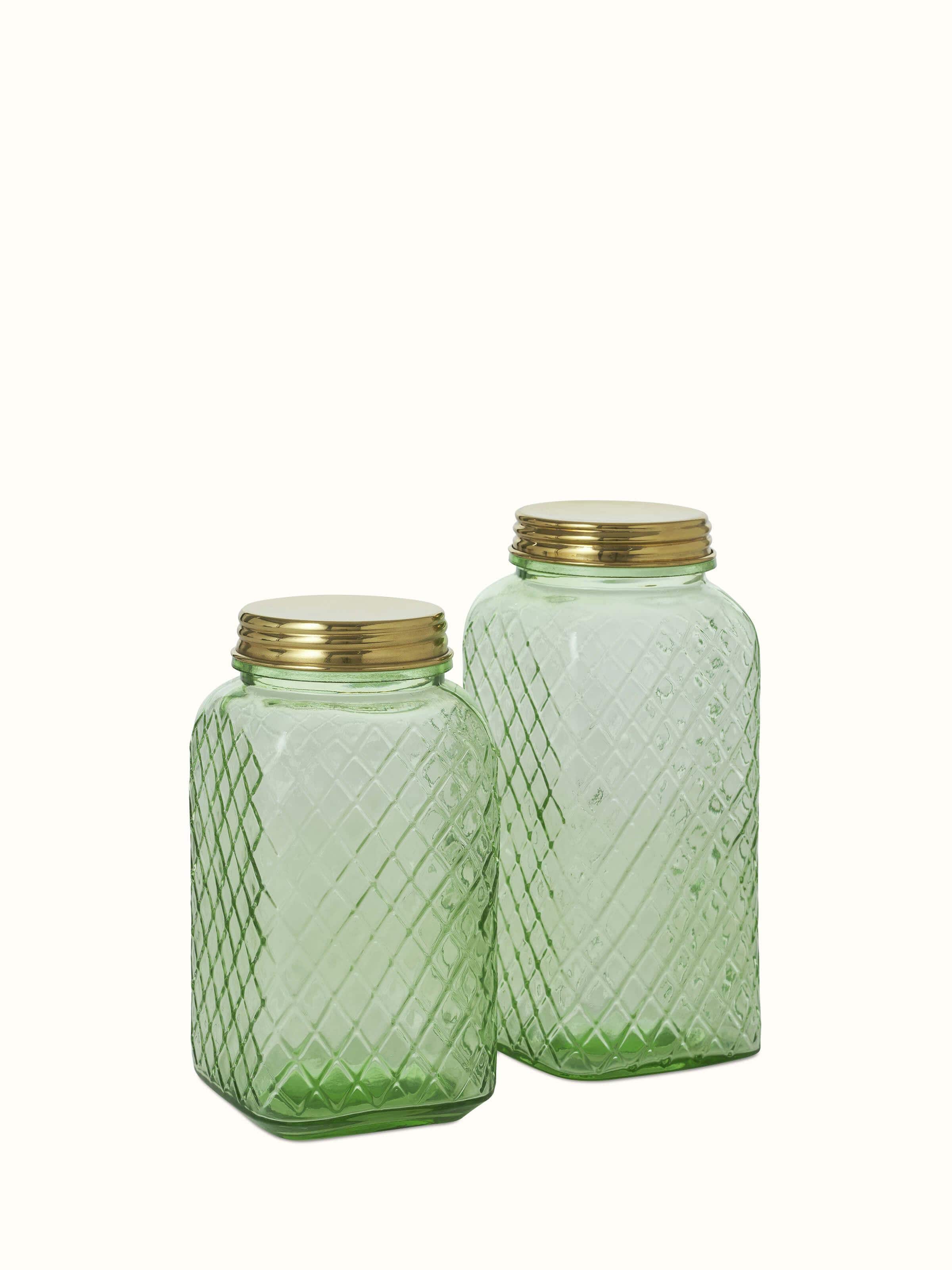 Front view of green glass-worked storage containers, set of 2, showcasing the unique design and color.
