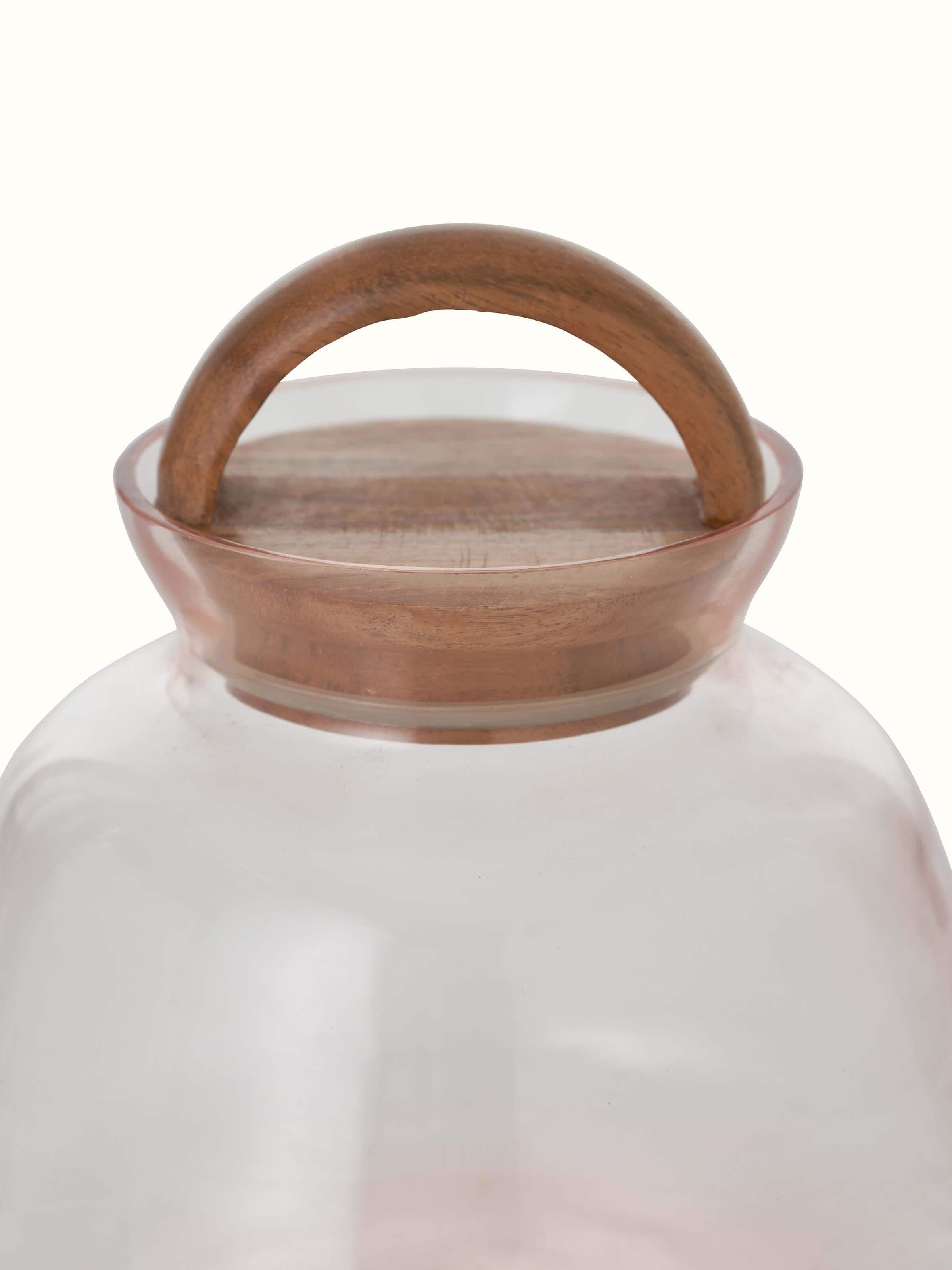 Detailed close-up of pink glass-worked storage container showing the intricate design and craftsmanship