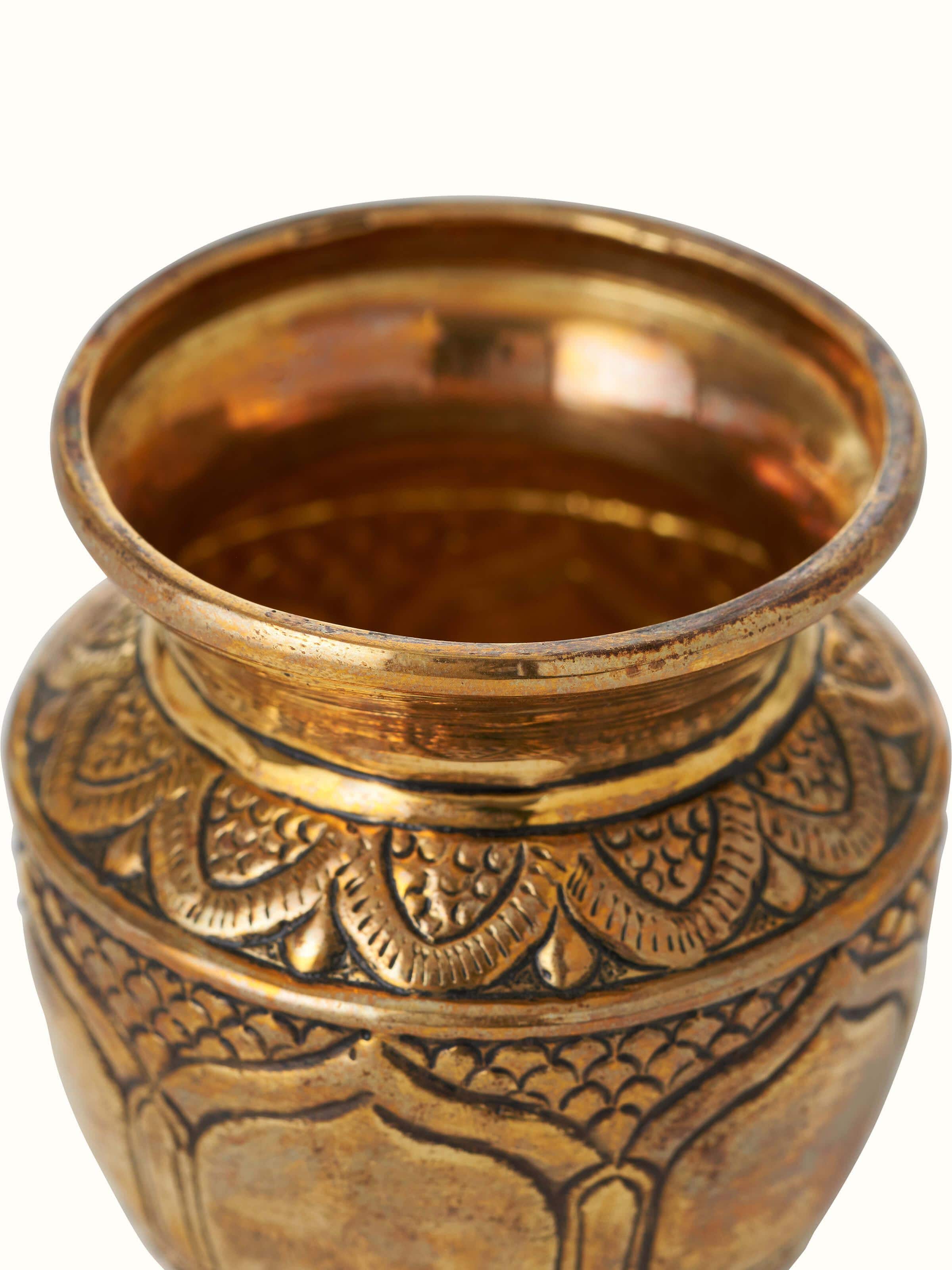 Angled view of Polished brass barri kalash showcasing its elegant design and smooth brass finish