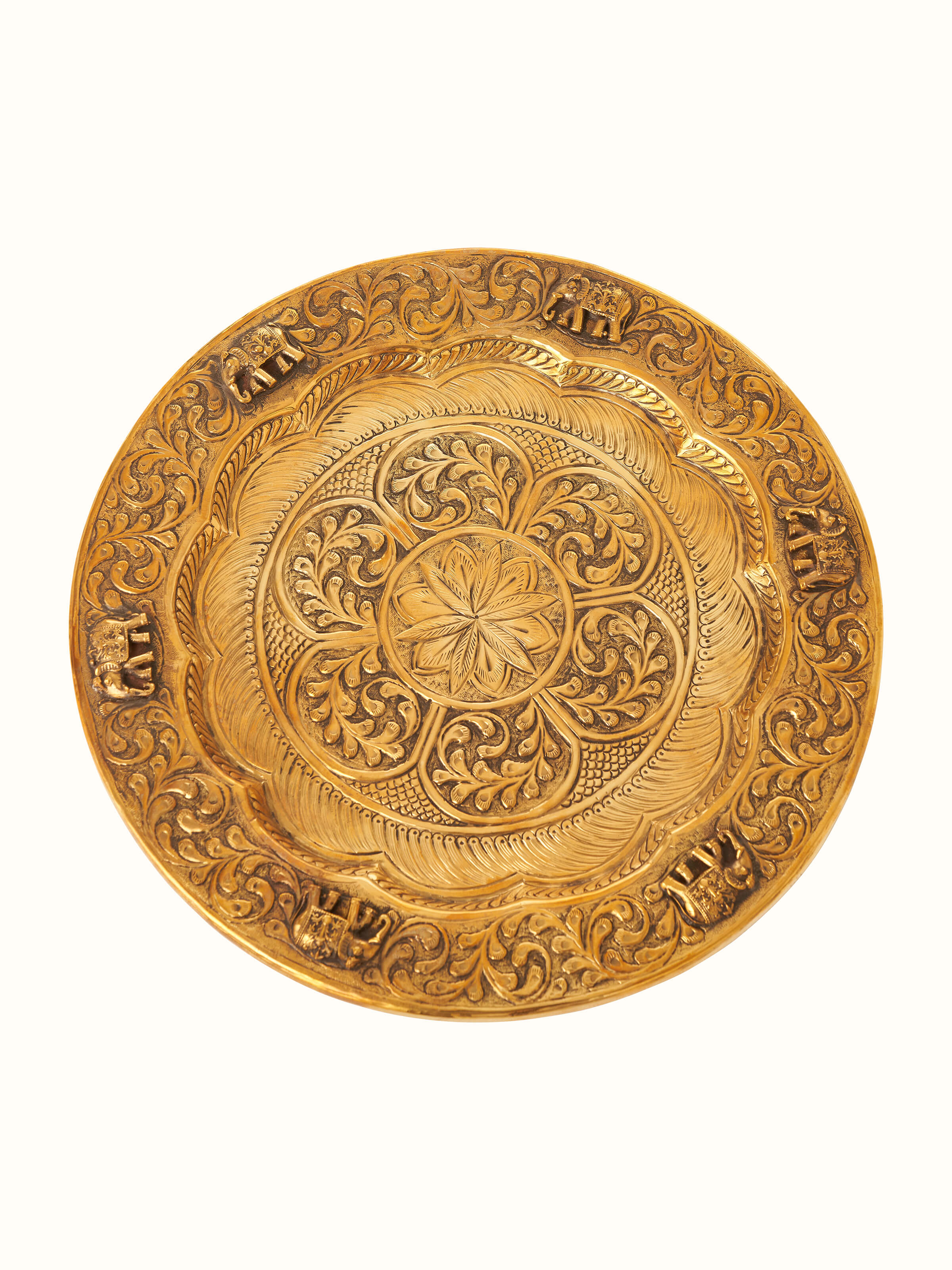 Close-up of Polished brass Gajanan pooja thali showing intricate design and high-quality brasswork.