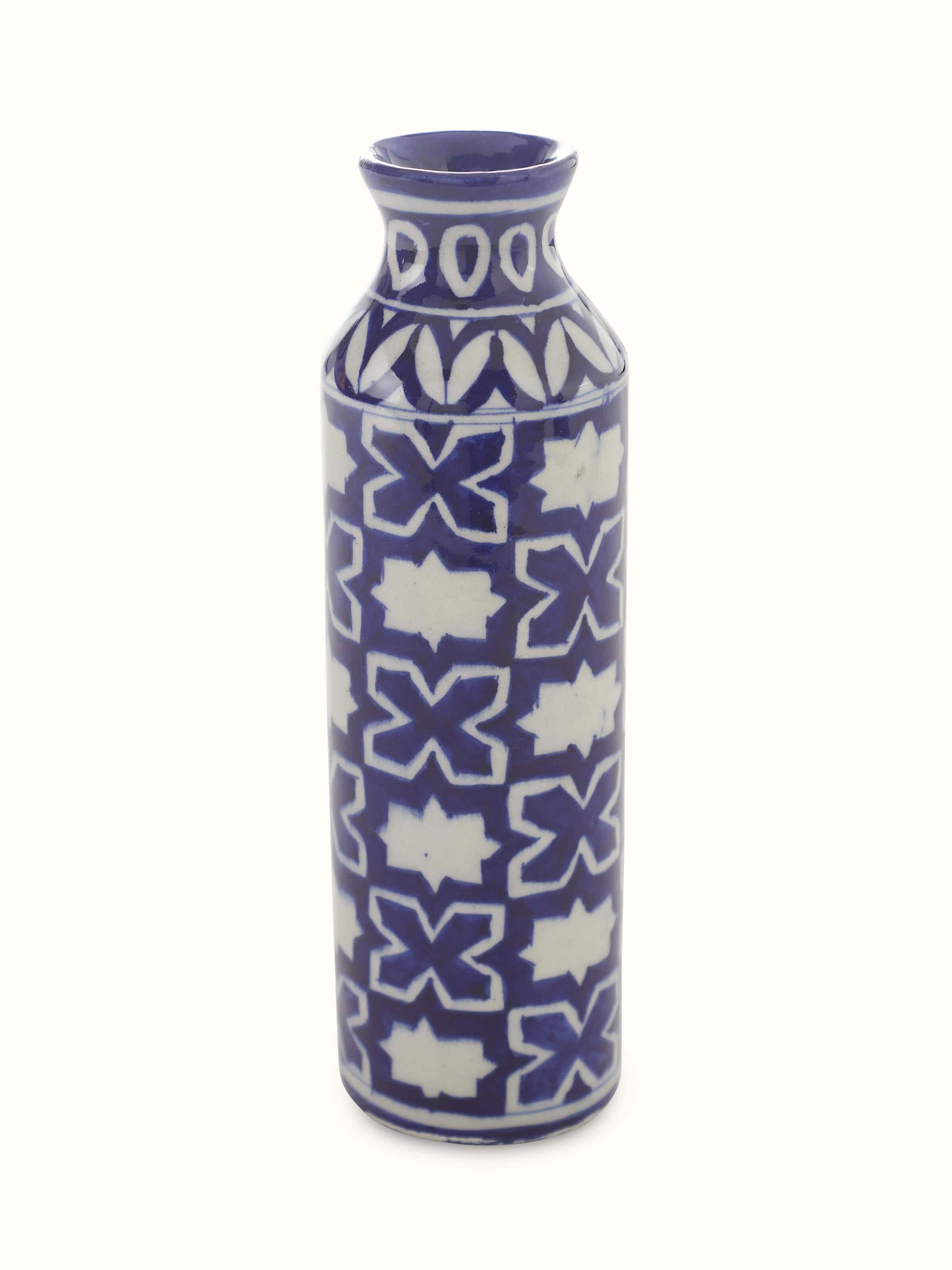 Front view of Blue pottery ceramic bud vase showcasing its intricate design and blue pottery patterns.