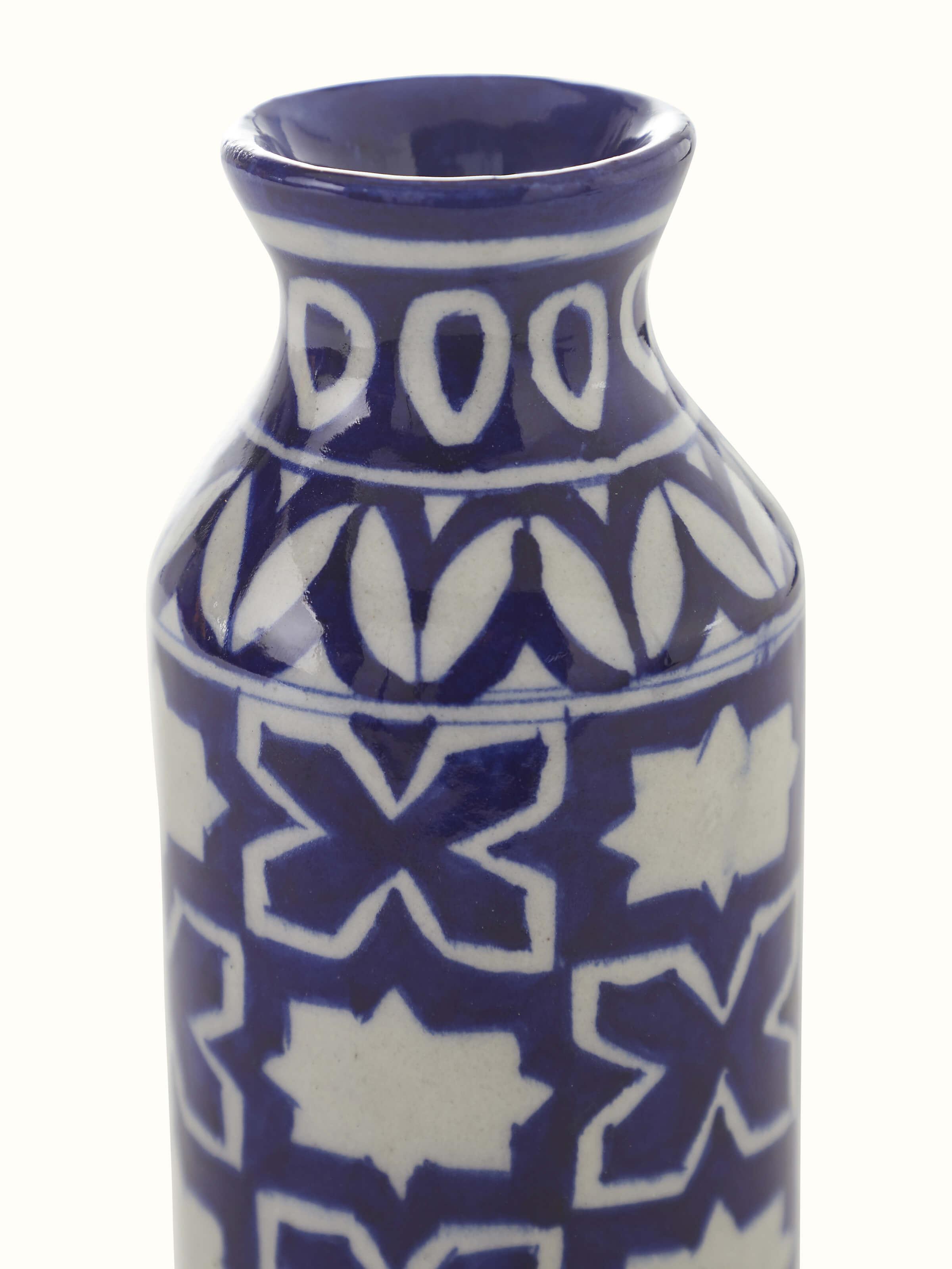 Detailed close-up of Blue pottery ceramic bud vase highlighting the intricate patterns and craftsmanship.