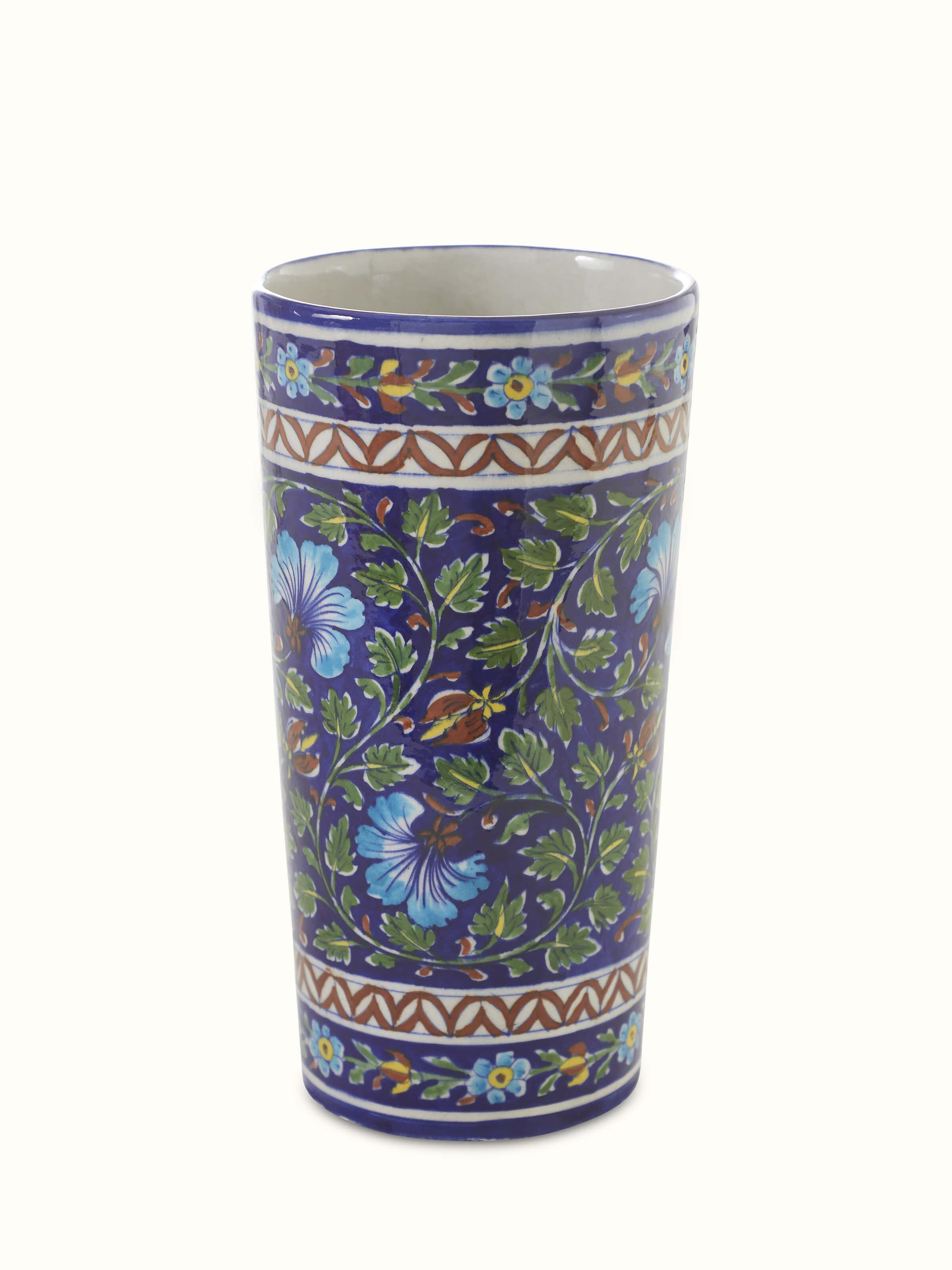 Front view of large blue pottery ceramic table vase displaying traditional design and vibrant blue glaze