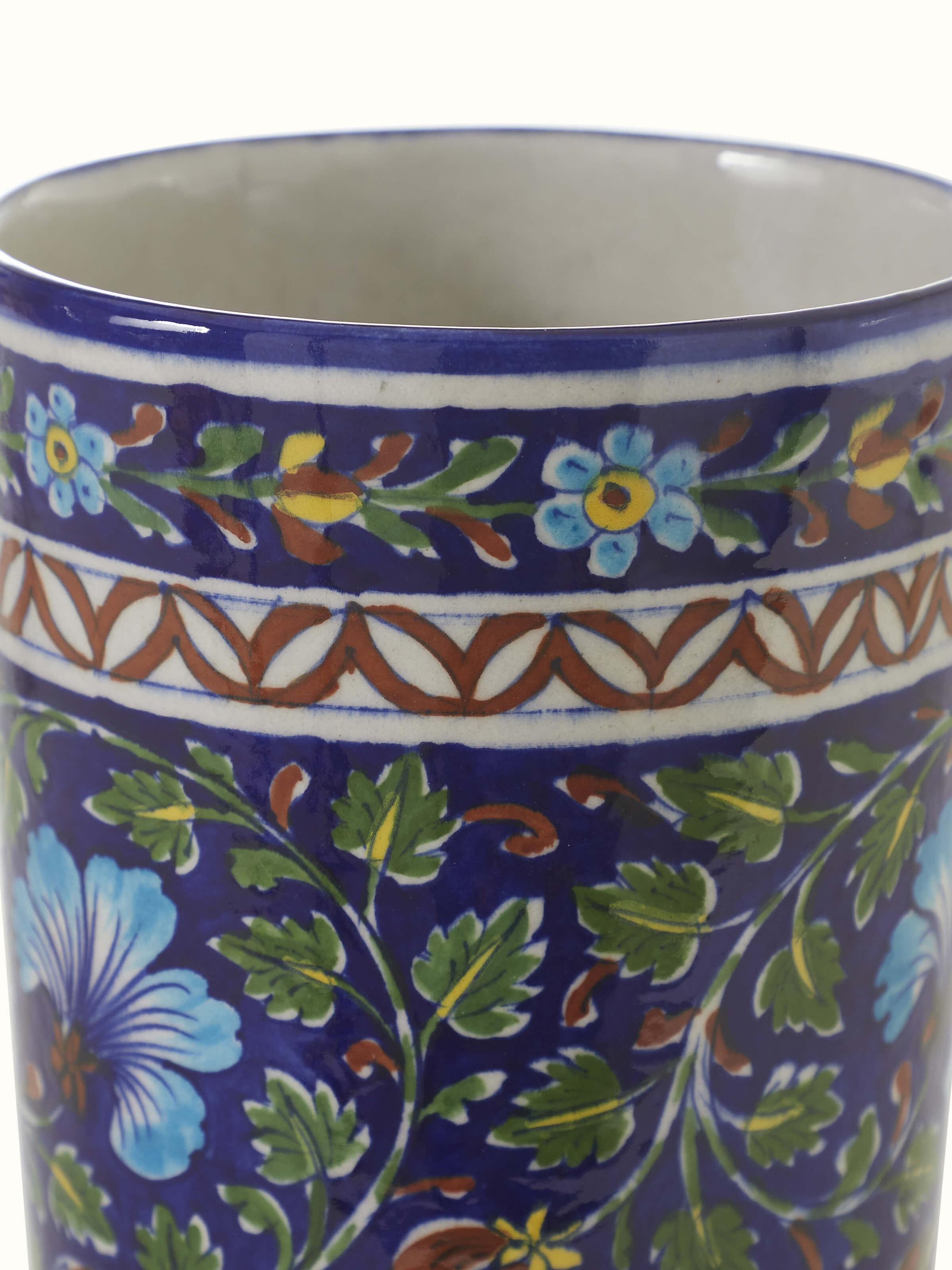 Close-up view of large blue pottery ceramic table vase highlighting the elegant finish and texture of the ceramic