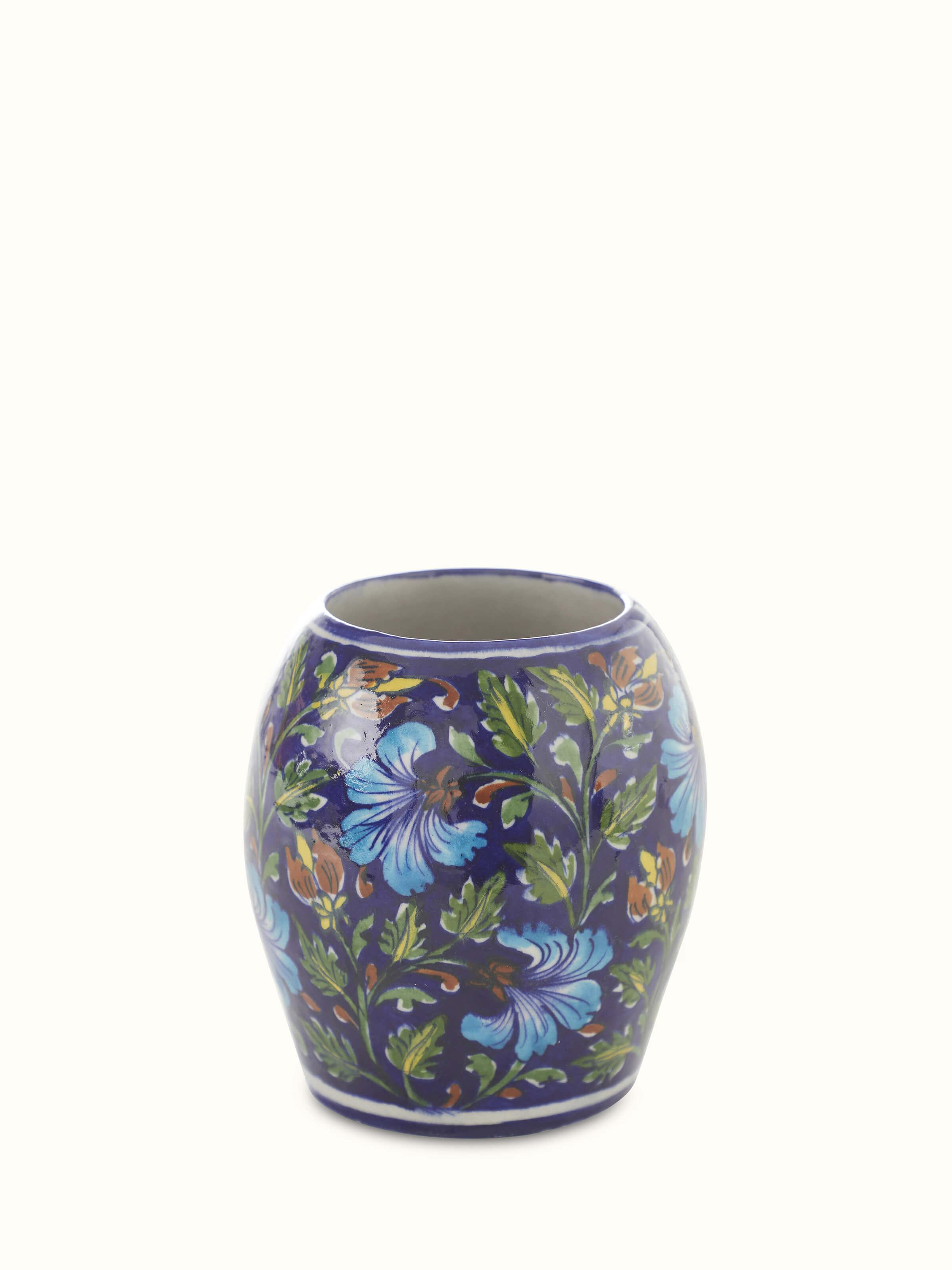Front view of Traditional blue pottery ceramic table vase with decorative patterns.