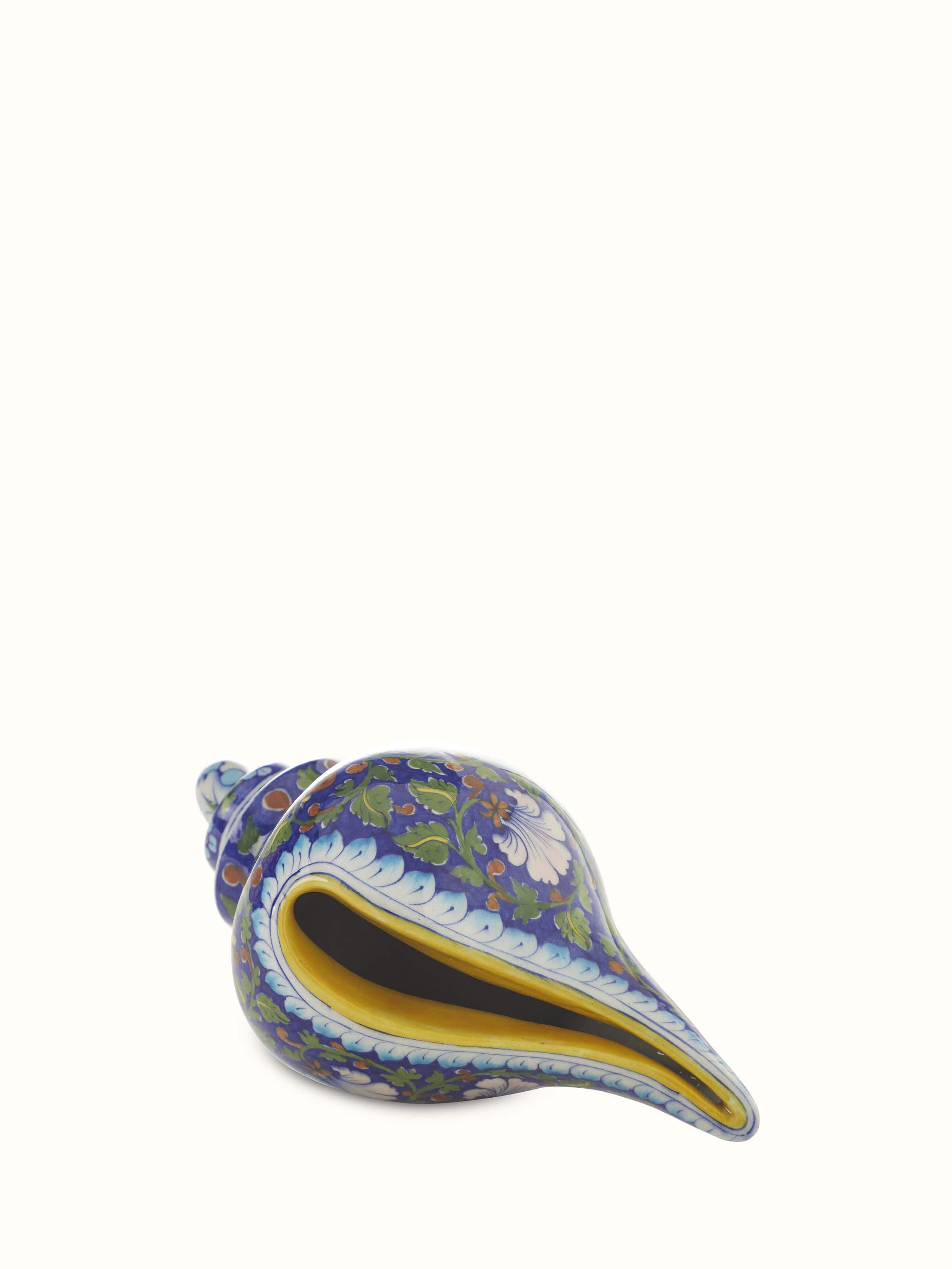 Front view of Blue pottery ceramic garden shell artpiece displaying vibrant blue and intricate ceramic design