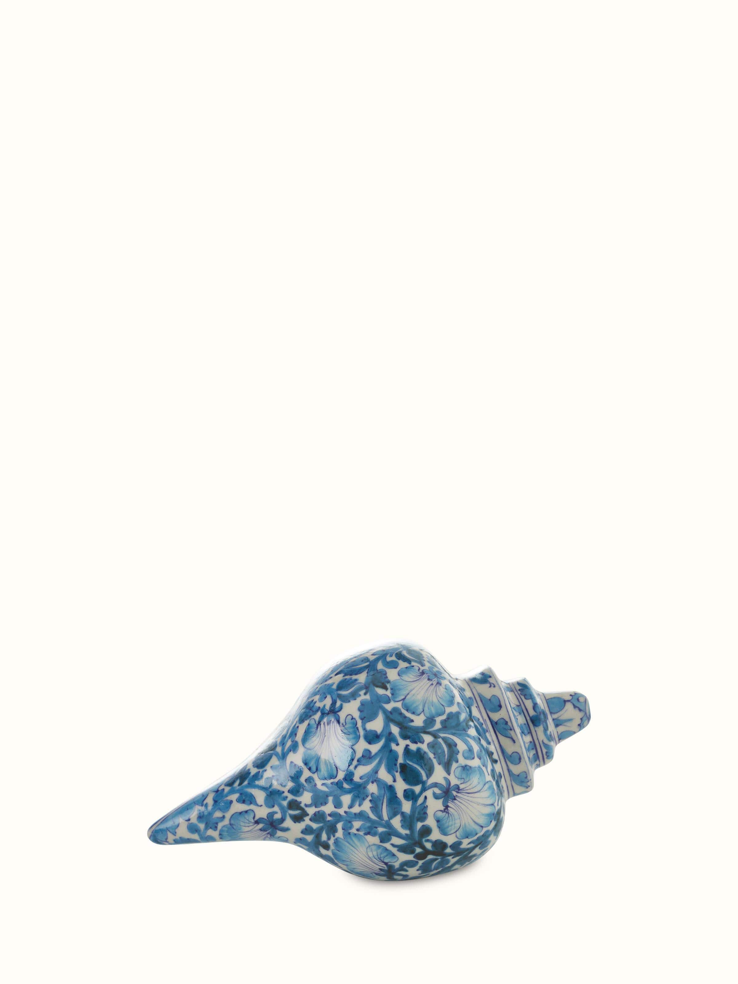 Angled view of blue pottery ceramic buds and bloom shell artpiece