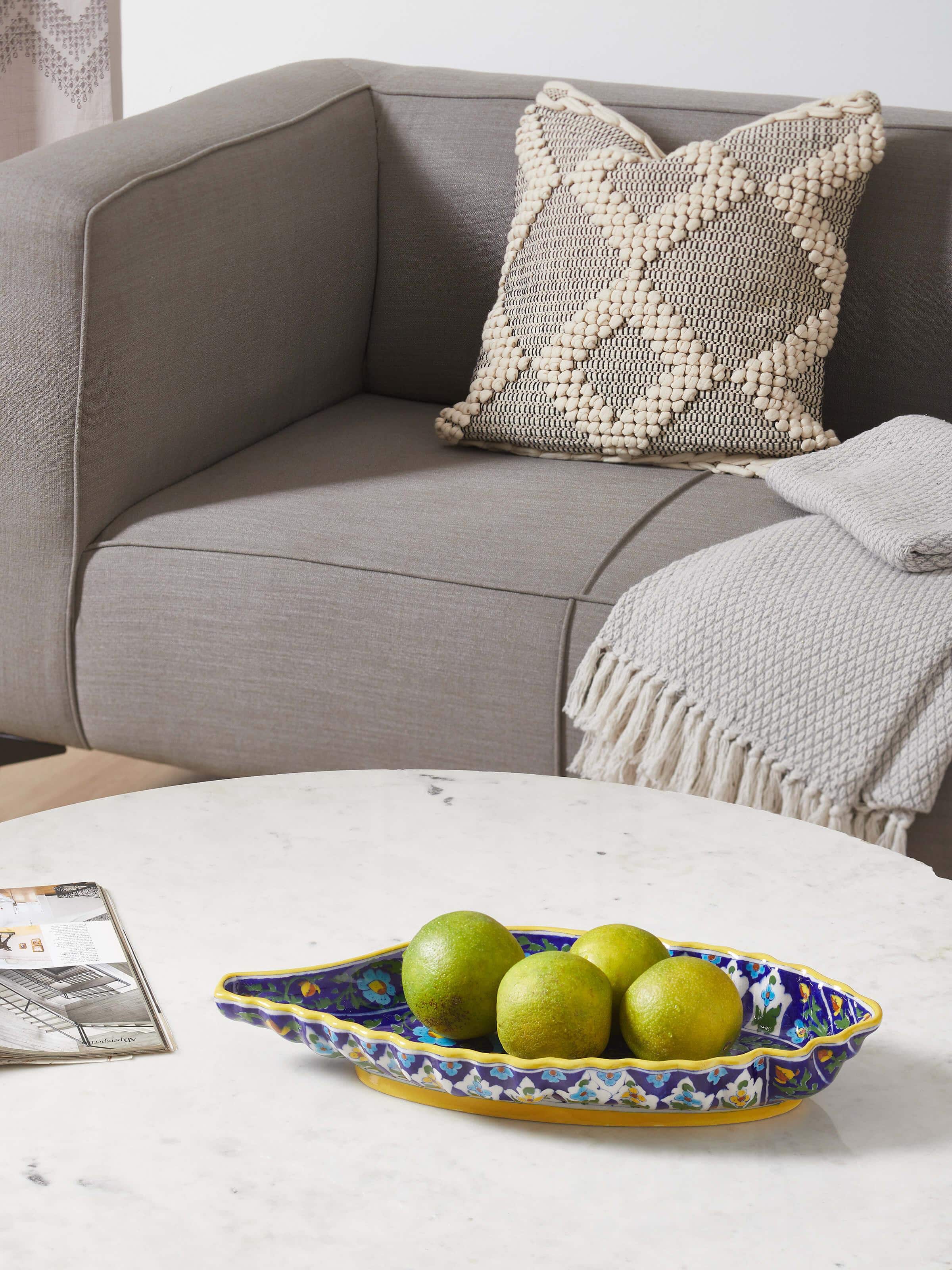 Angled view showing vibrant blue pottery colors