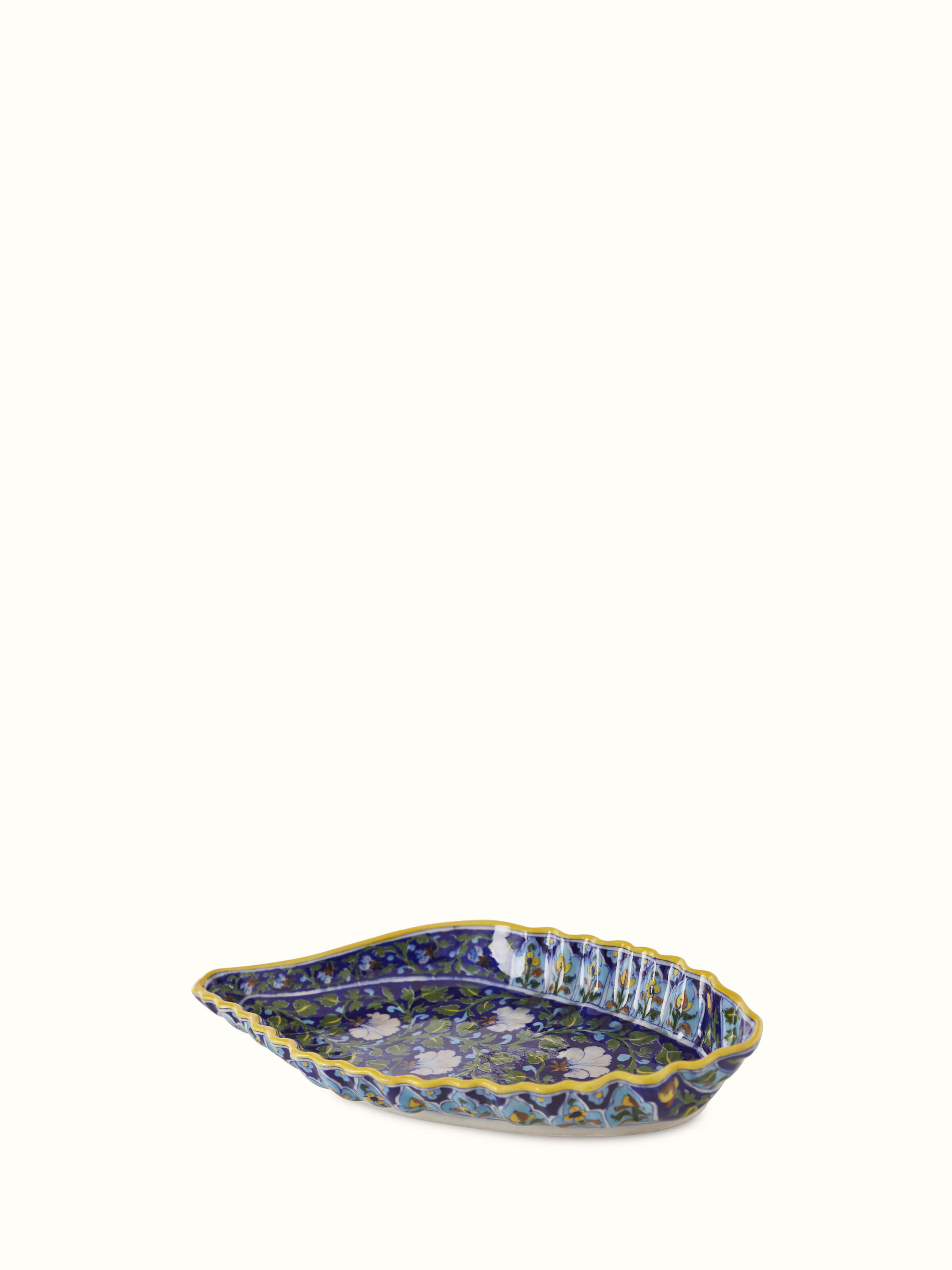 Full view of blue pottery ceramic conch shell planter, showcasing its decorative elements and artisanal quality.
