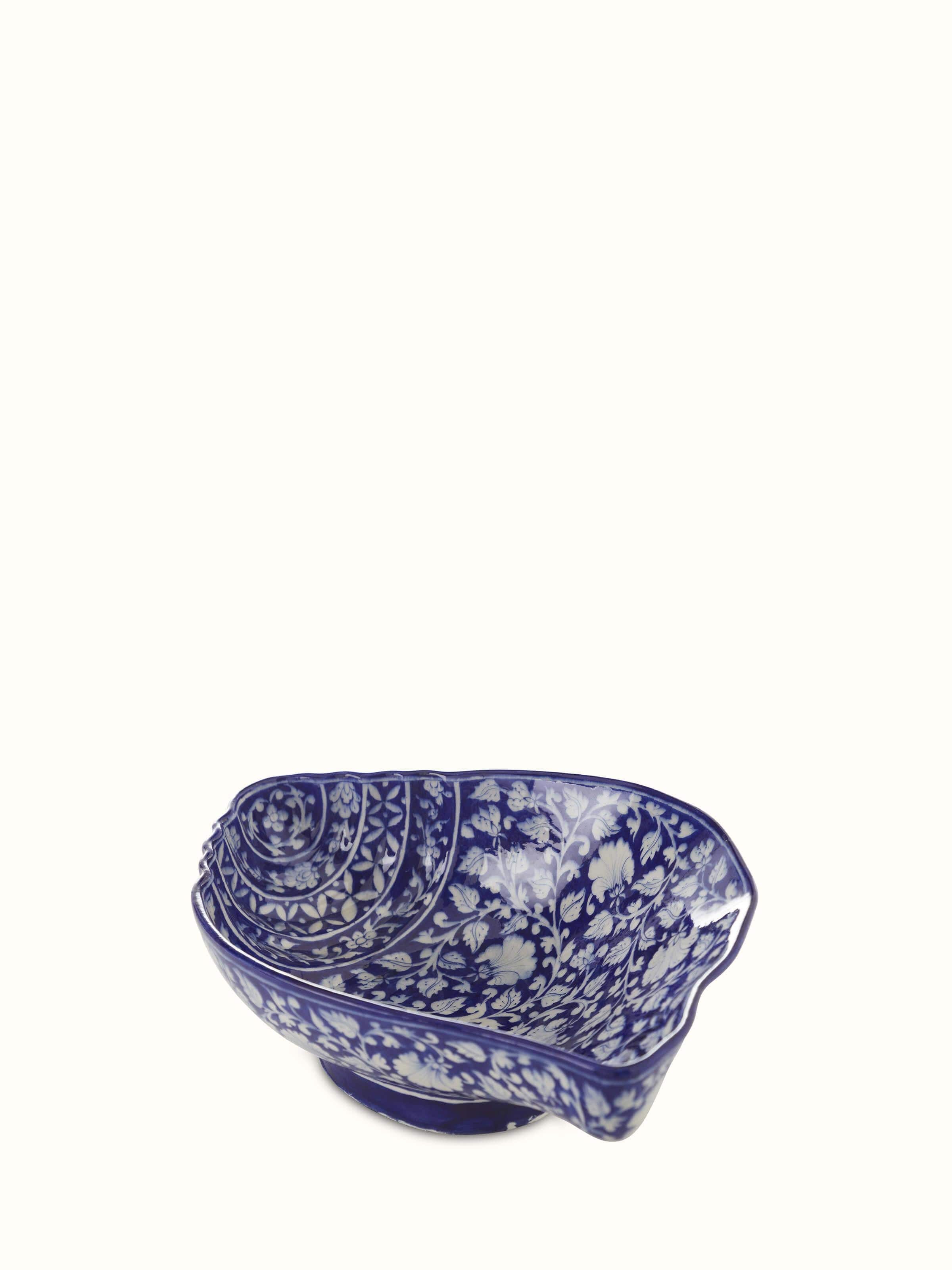 Front view of Glossy blue pottery ceramic conch shell planter highlighting its smooth finish.