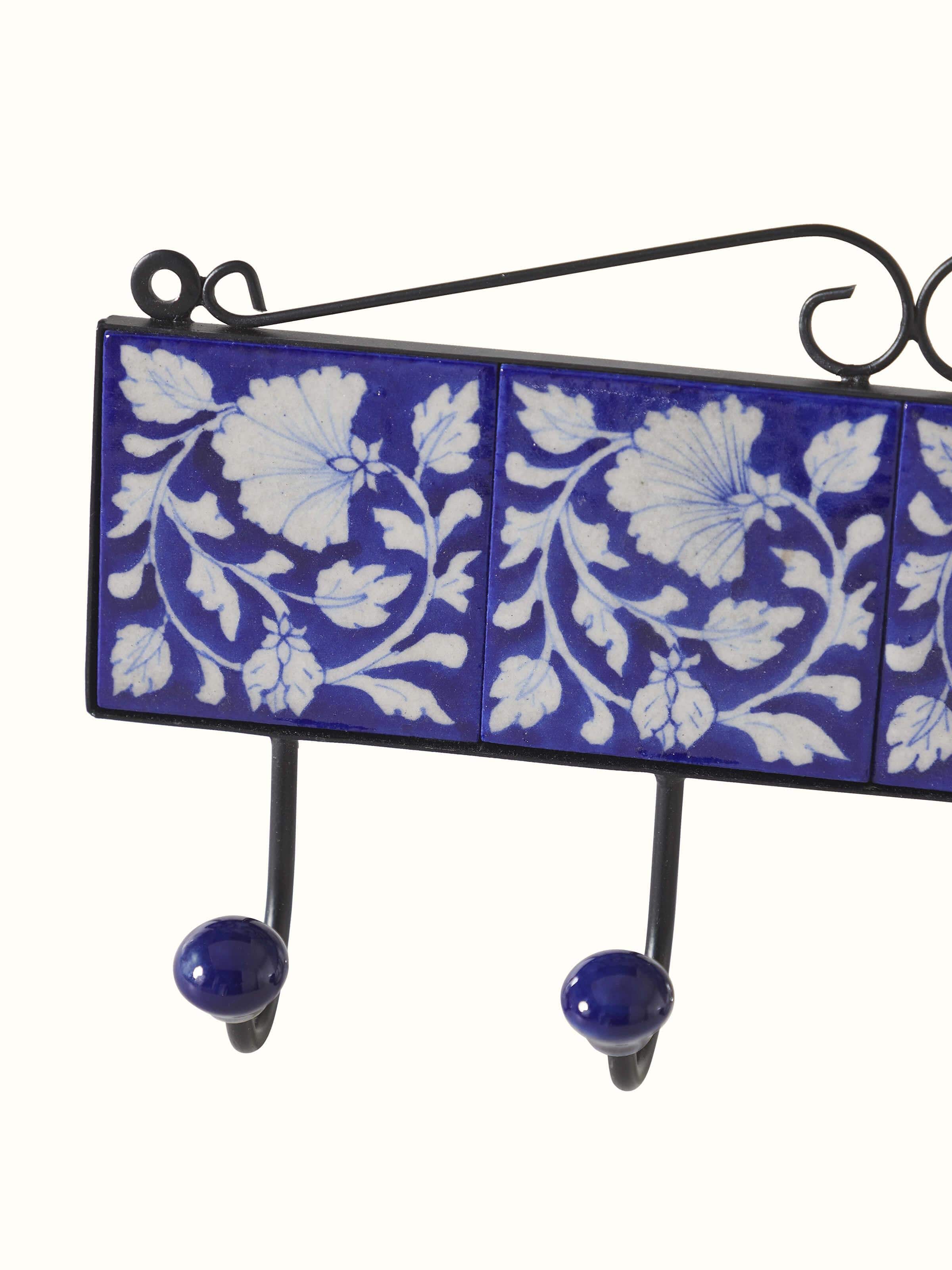 Detailed view of Glossy blue pottery ceramic 4-pin wall hook highlighting practical design