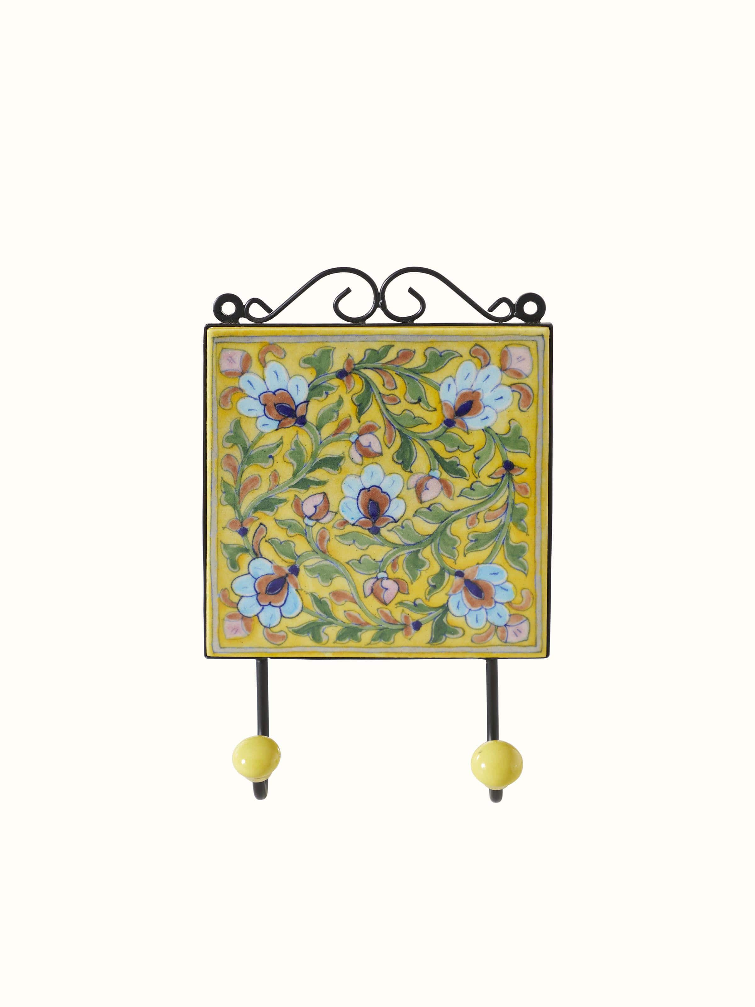 Front view of Blue Pottery Ceramic 2-Pin Wall Hook in Yellow Color showcasing vibrant design.