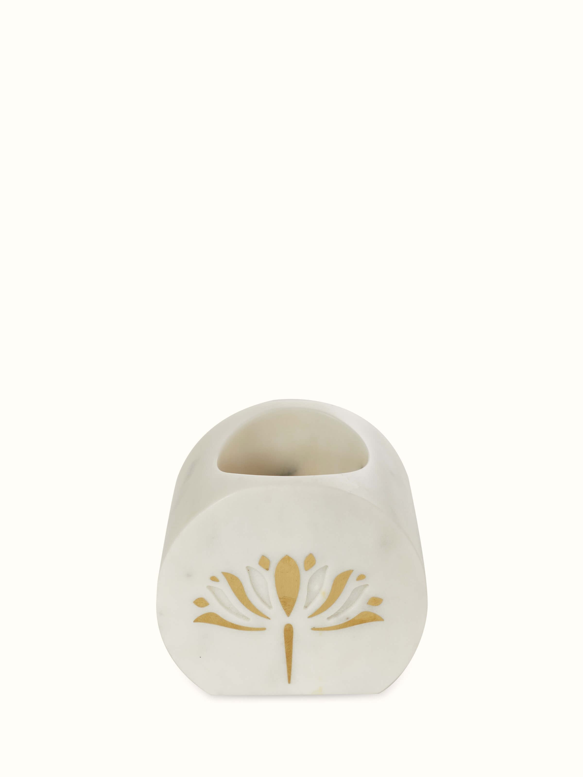 Close-up view of Stone-Worked Marble & Brass Toothbrush Holder emphasizing its texture and detail