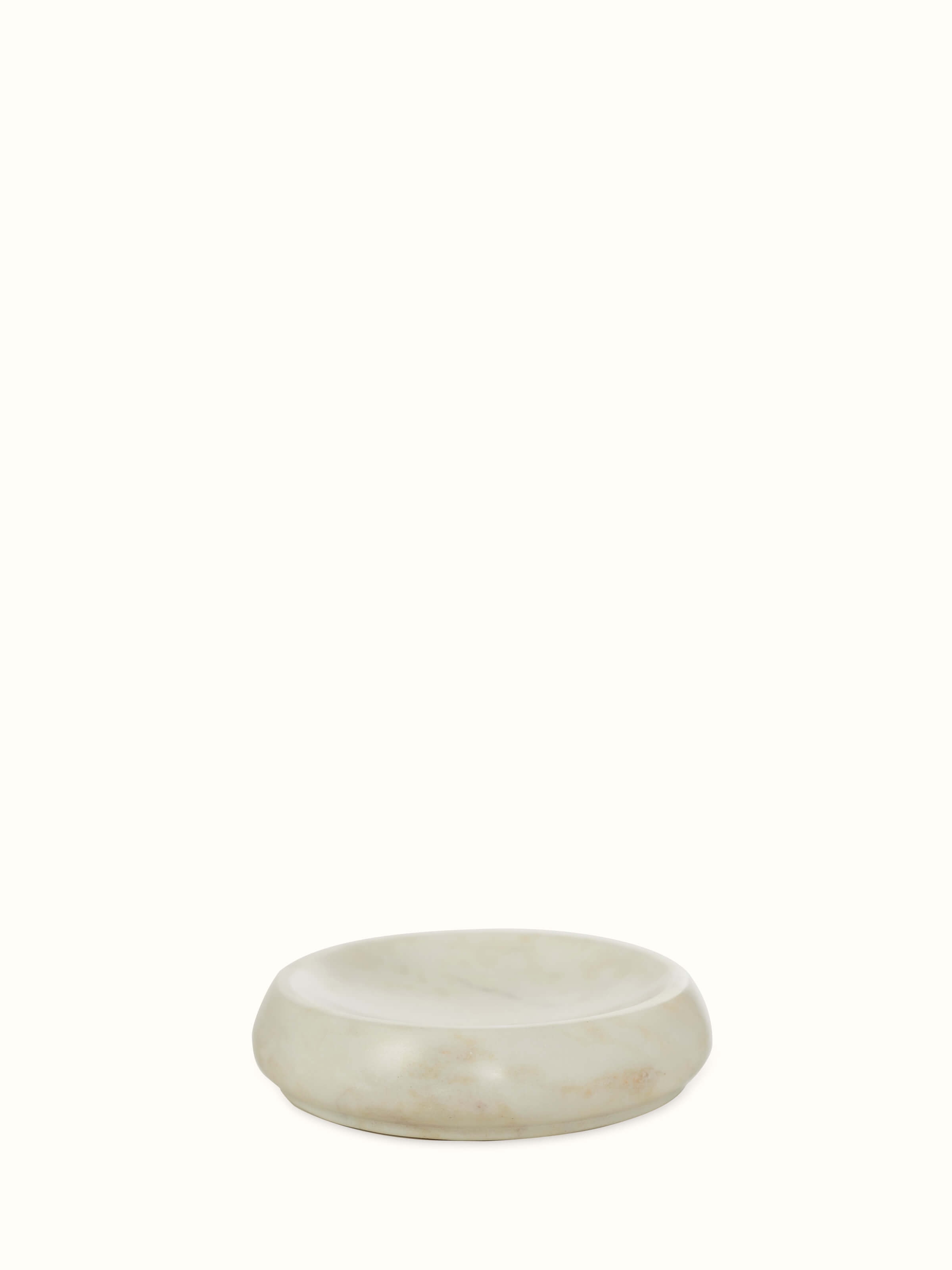 Stone-worked marble and brass soap dish in white, featuring detailed carvings and elegant design.