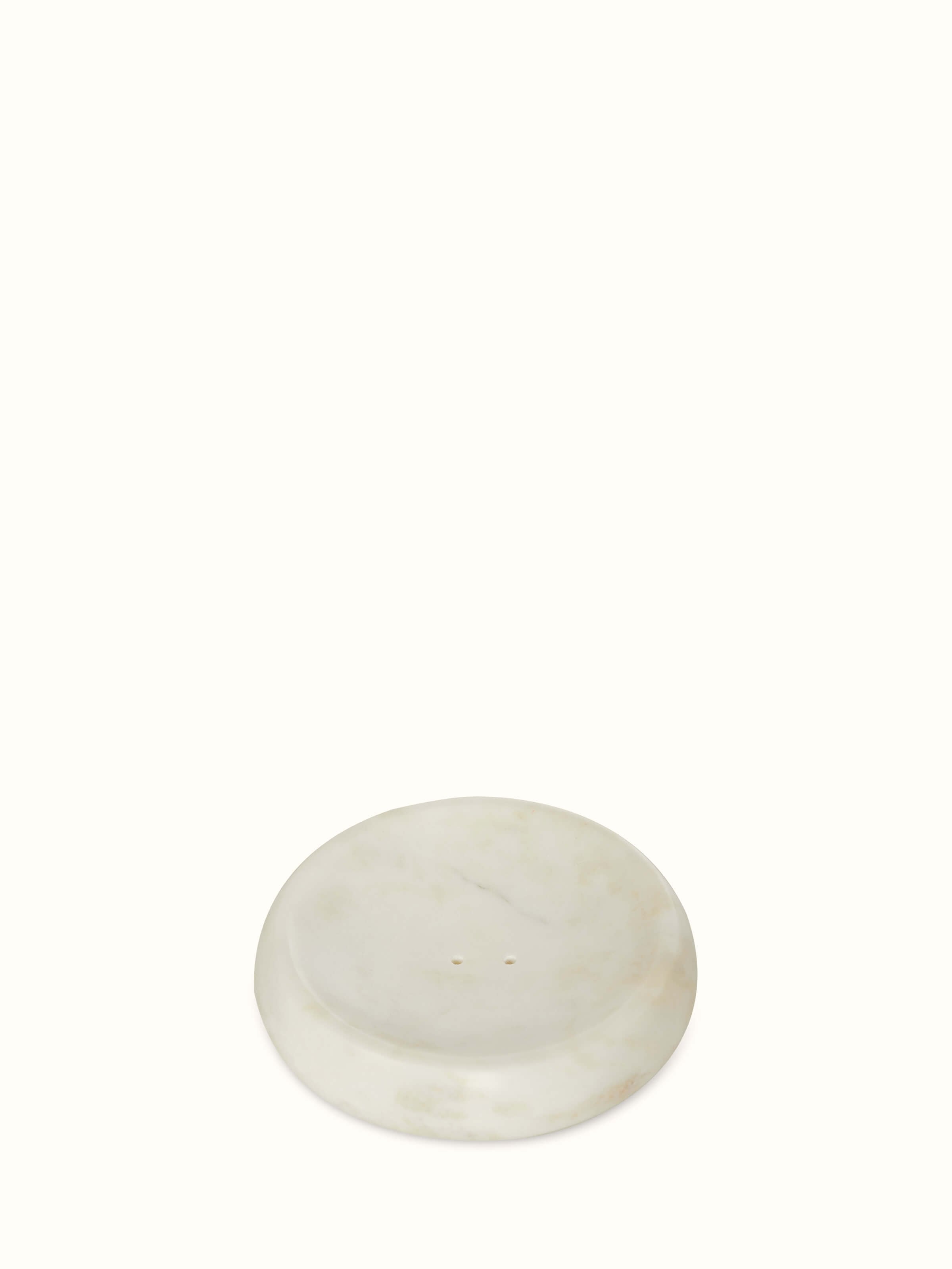 Full view of stone-worked marble and brass soap dish, emphasizing its detailed stone work and elegant brass fittings.