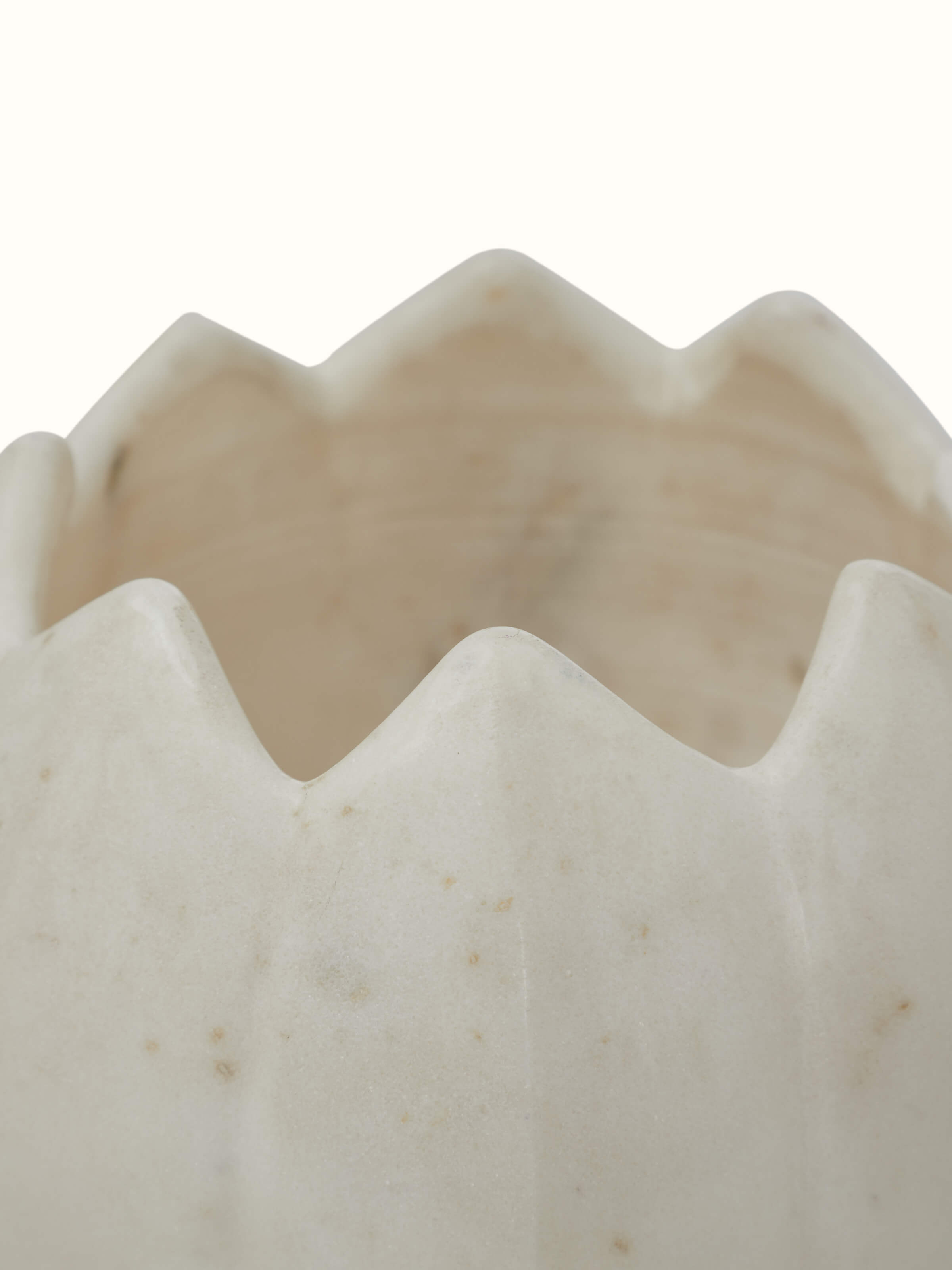 Detailed view of Stone-worked dodeca lotus white marble planter