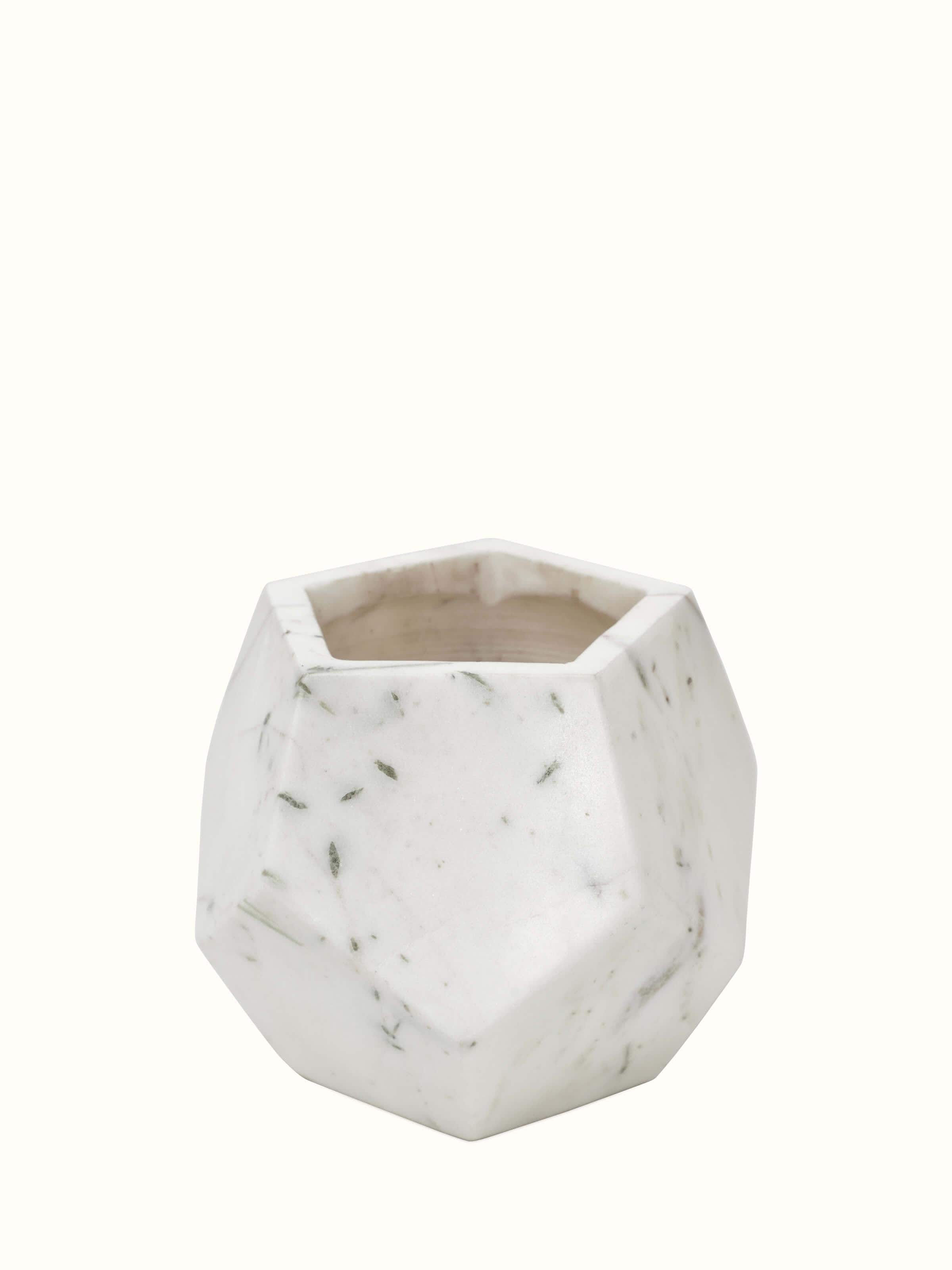 Front view of Stone-worked dodeca white marble planter featuring a geometric design and polished marble surface