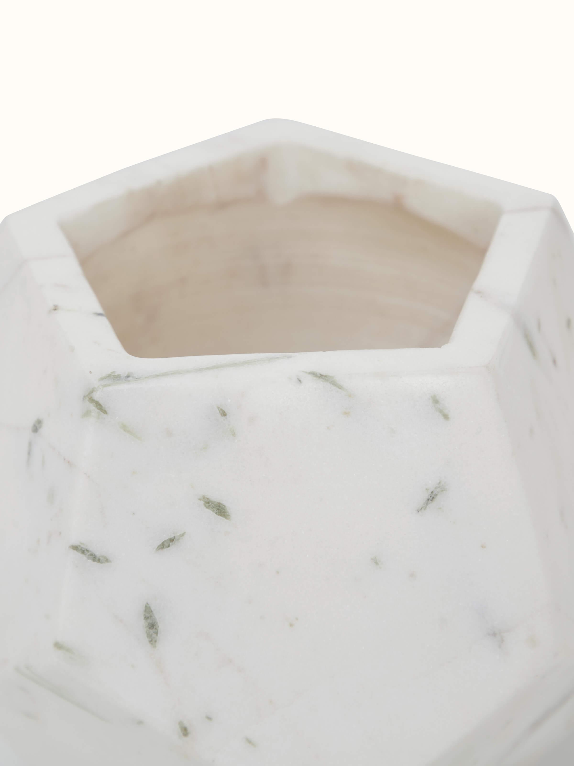 Close-up view of Stone-worked dodeca white marble planter highlighting the detailed stonework and smooth finish