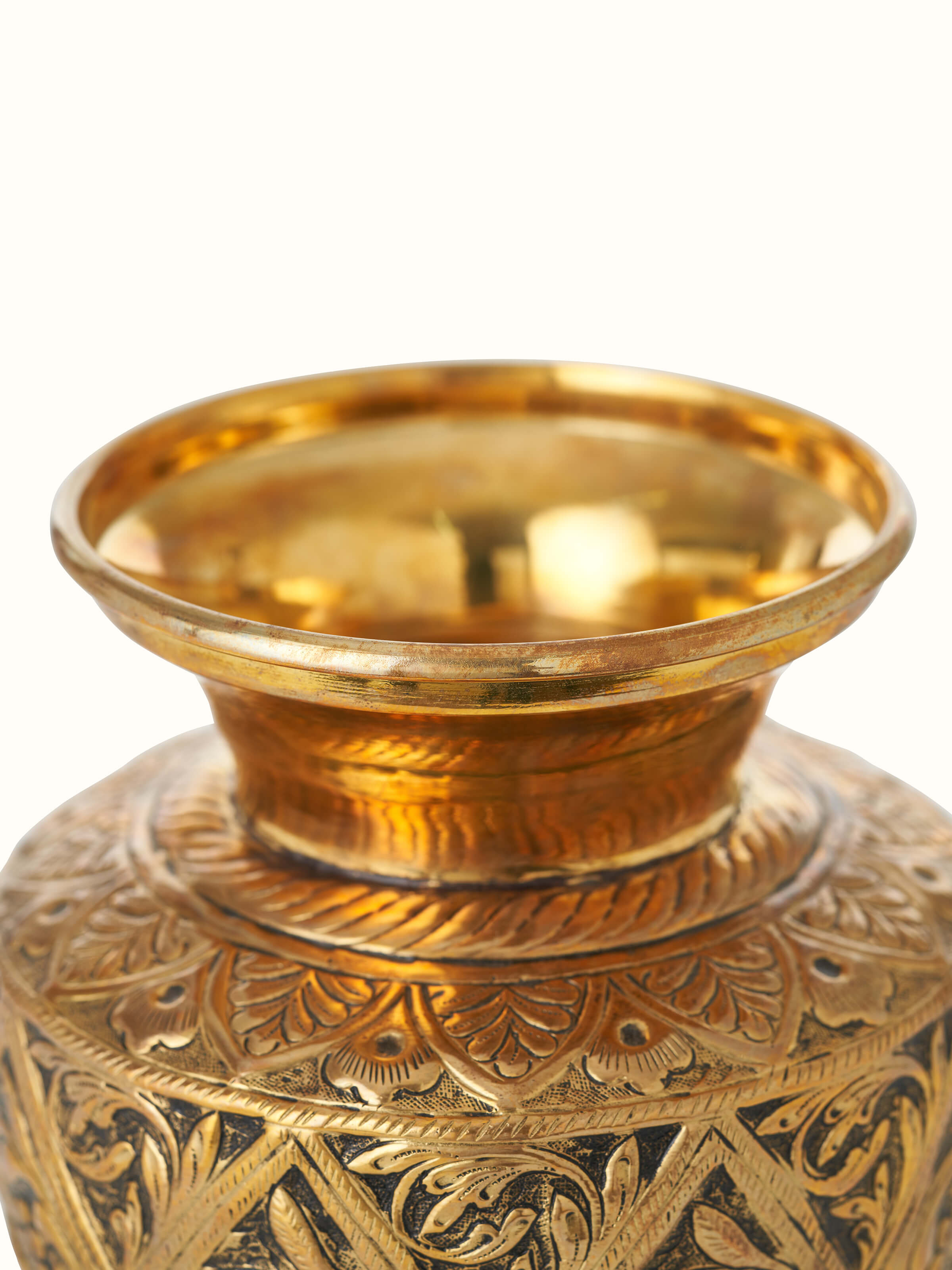 Detailed view of Polished brass table vase