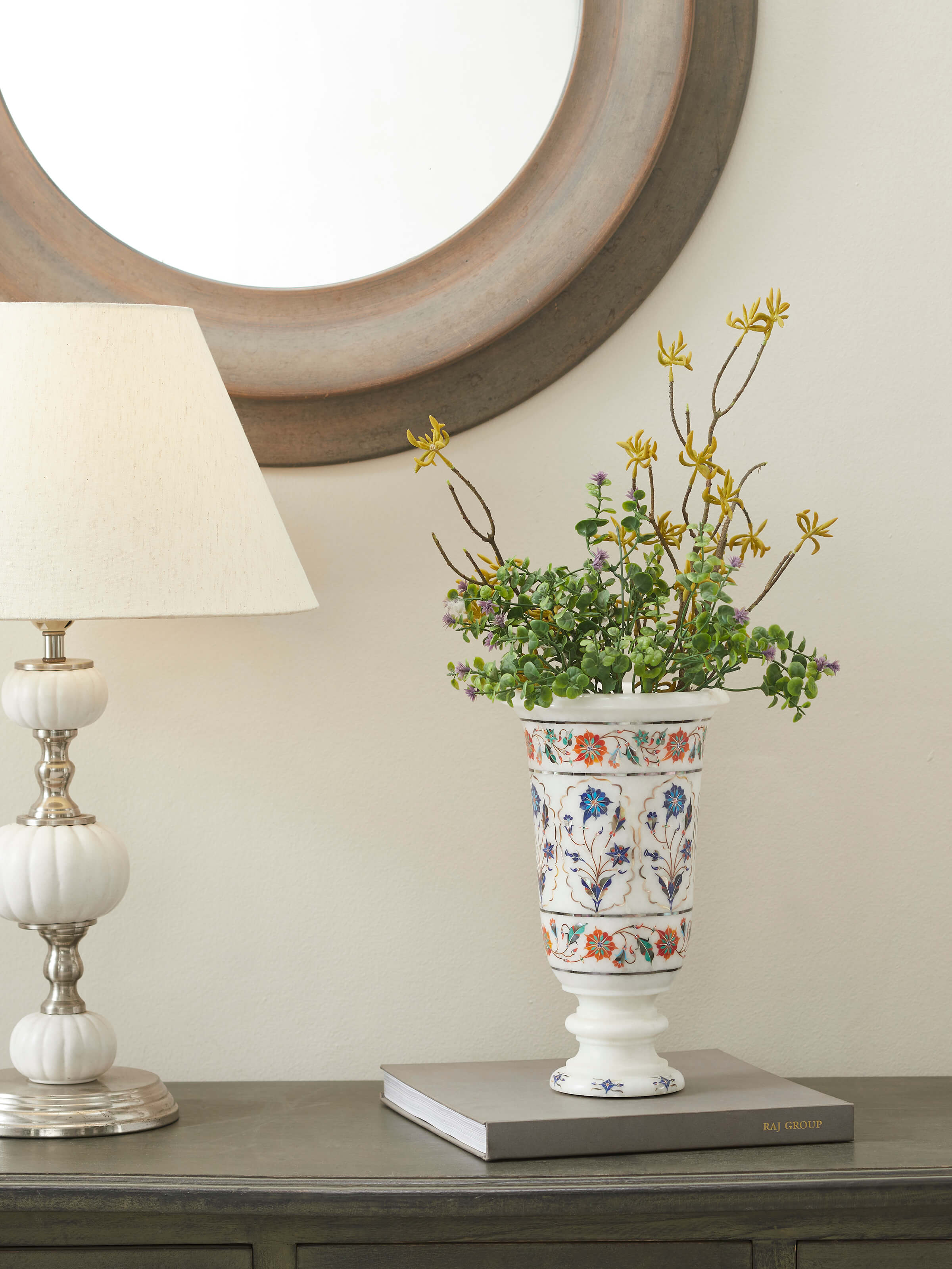 Close-up of Pacchikari marble floral table vase in white, highlighting the detailed floral carvings and elegant shape, Swadesh