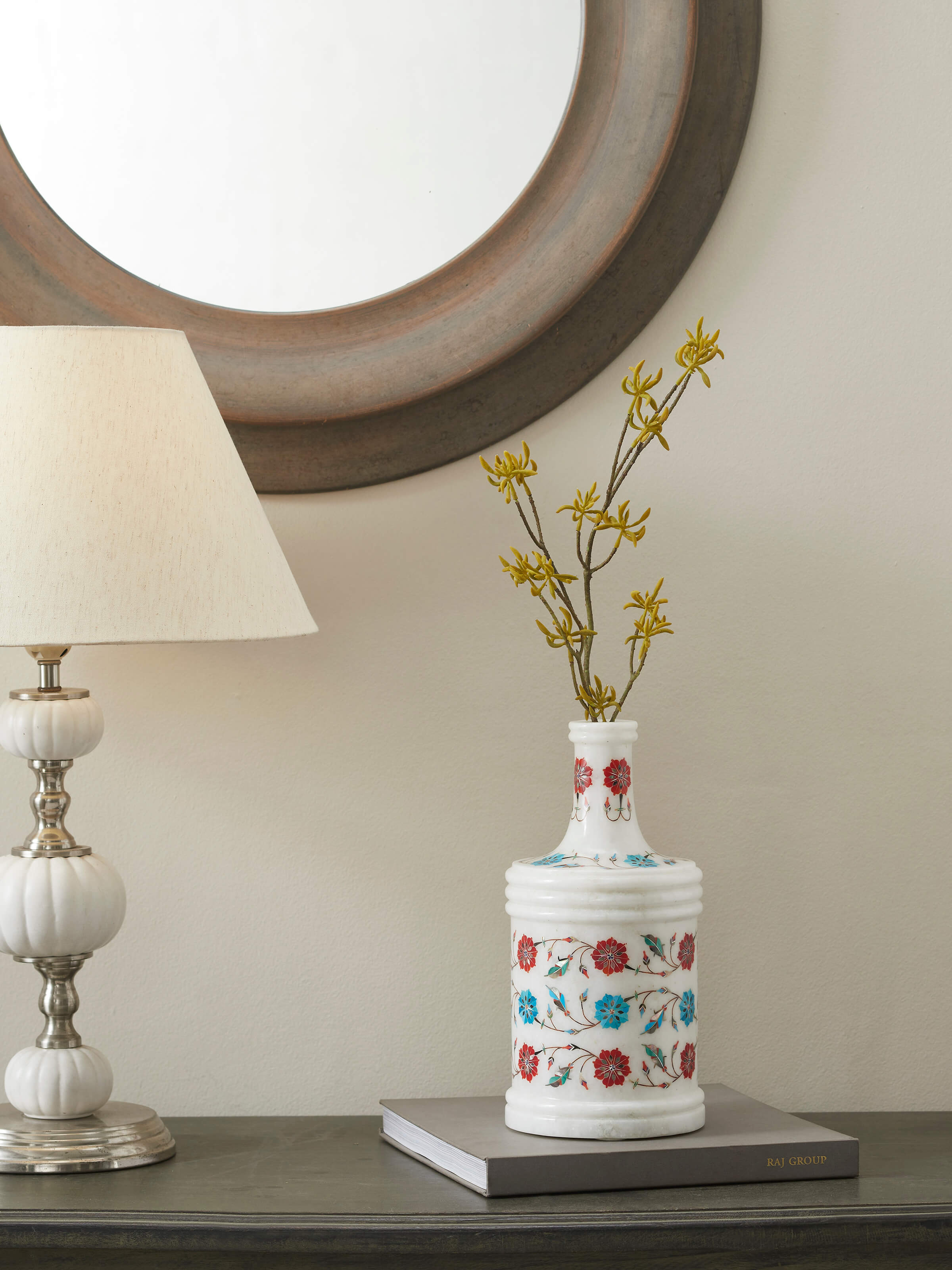 Close-up view of Pacchikari white marble table vase, highlighting the detailed marble texture and design.