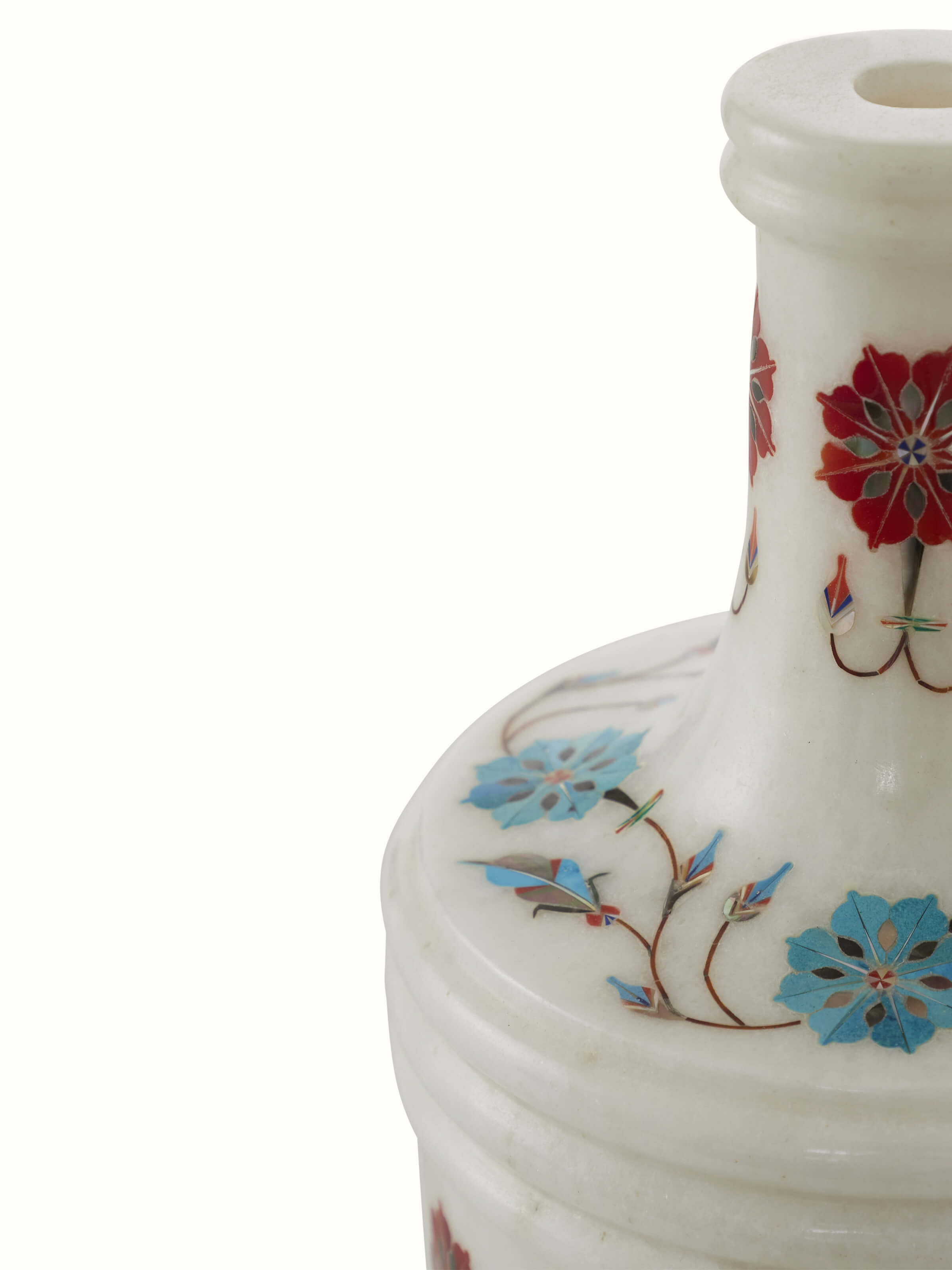 Side view of Pacchikari white marble table vase, emphasizing its elegant shape and intricate carving details.