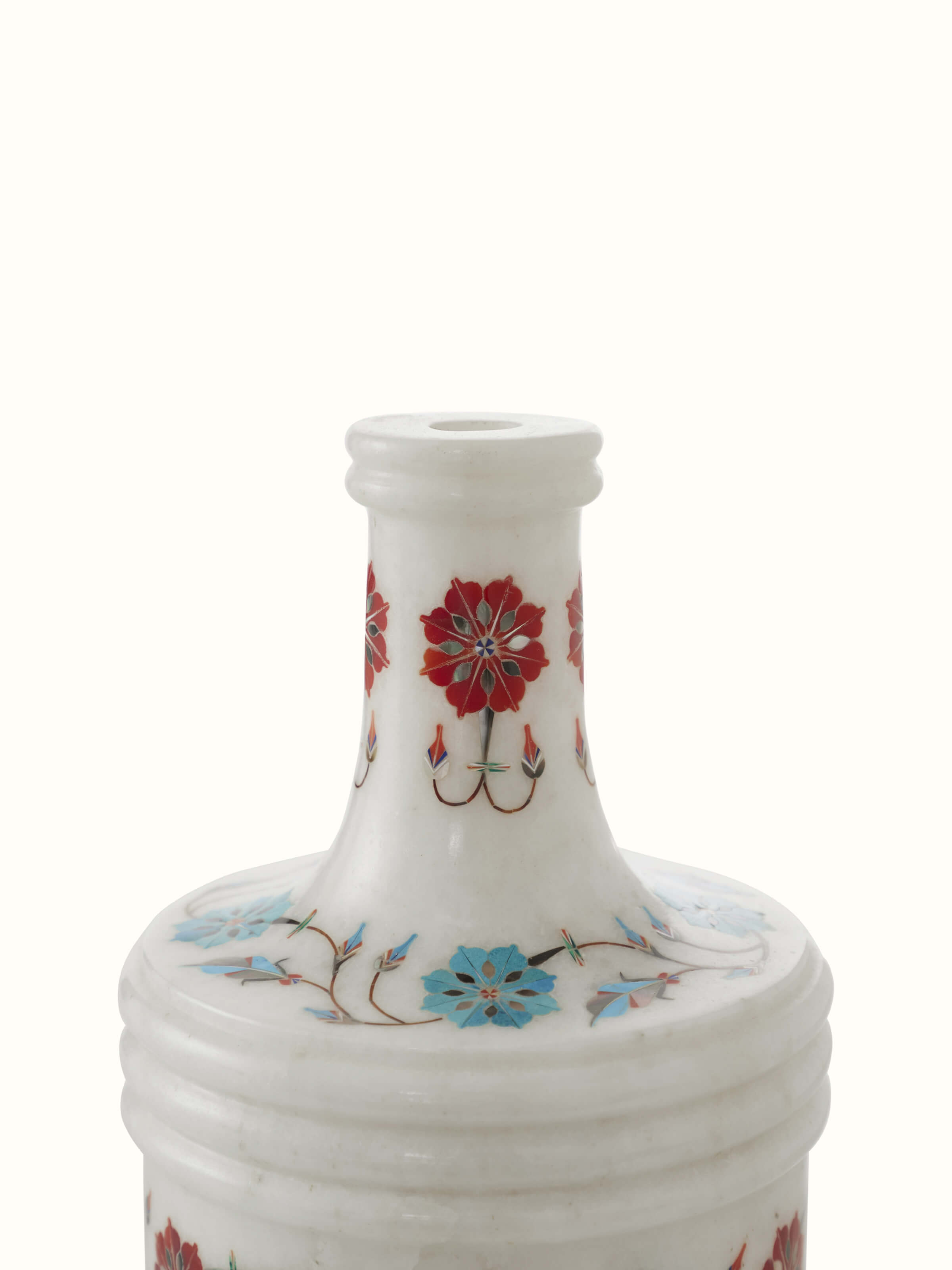Pacchikari white marble table vase displayed on a table, showing its stylish design and versatile decor use.