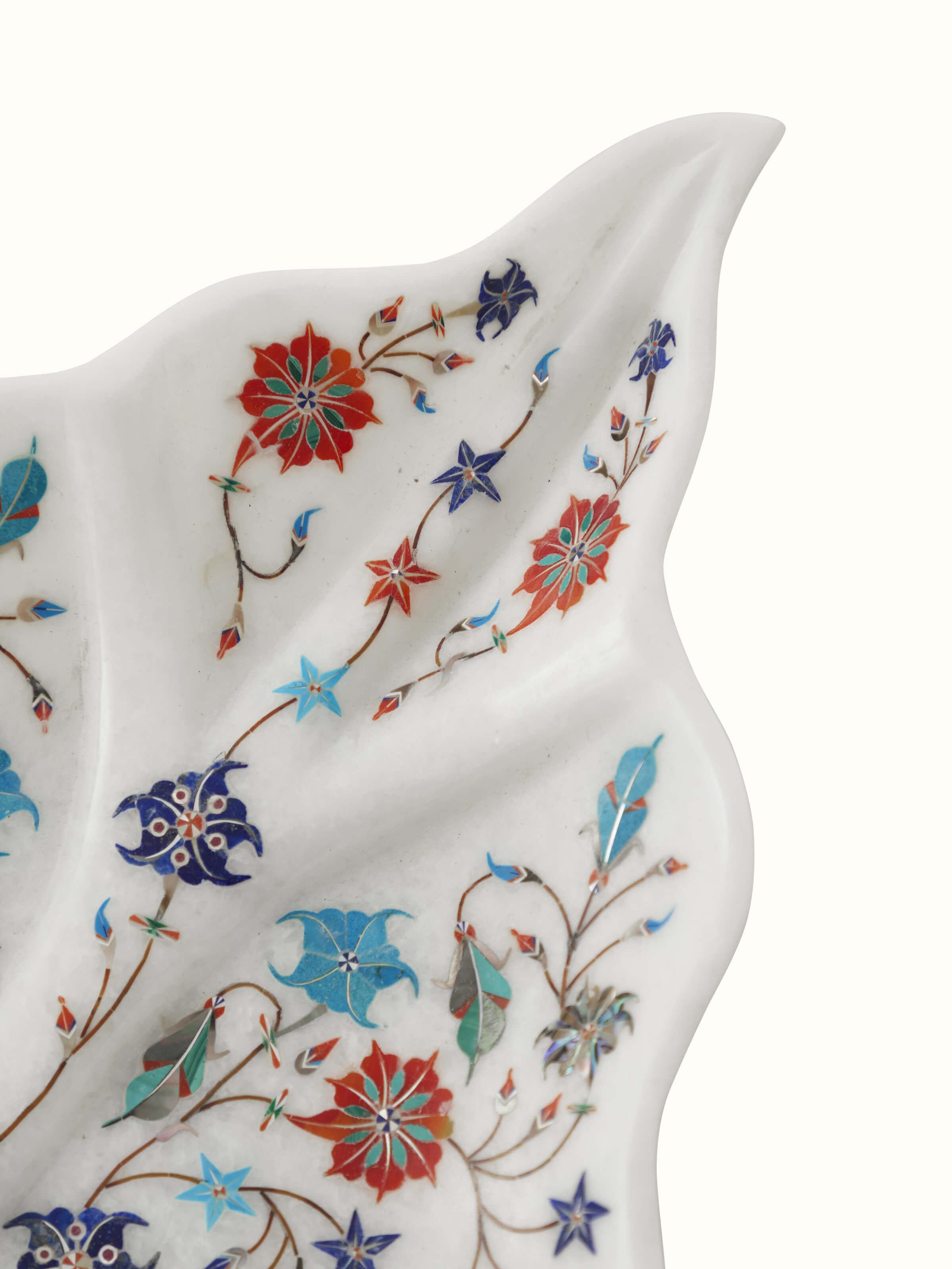 Close-up view of Pacchikari marble betel leaf decorative tray showcasing its artistic marble carvings.