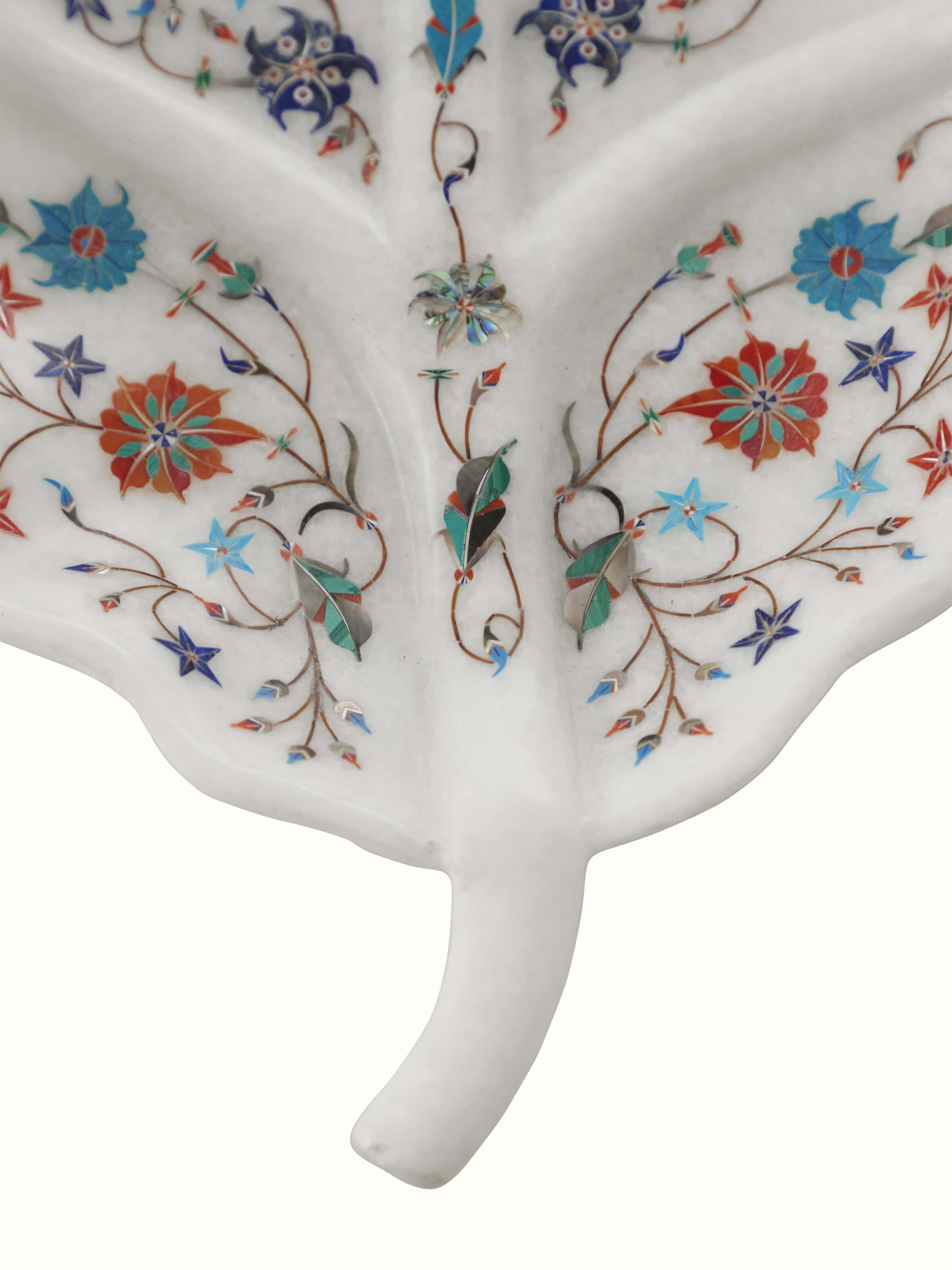 Detailed view of Pacchikari marble betel leaf decorative tray highlighting its premium finish.