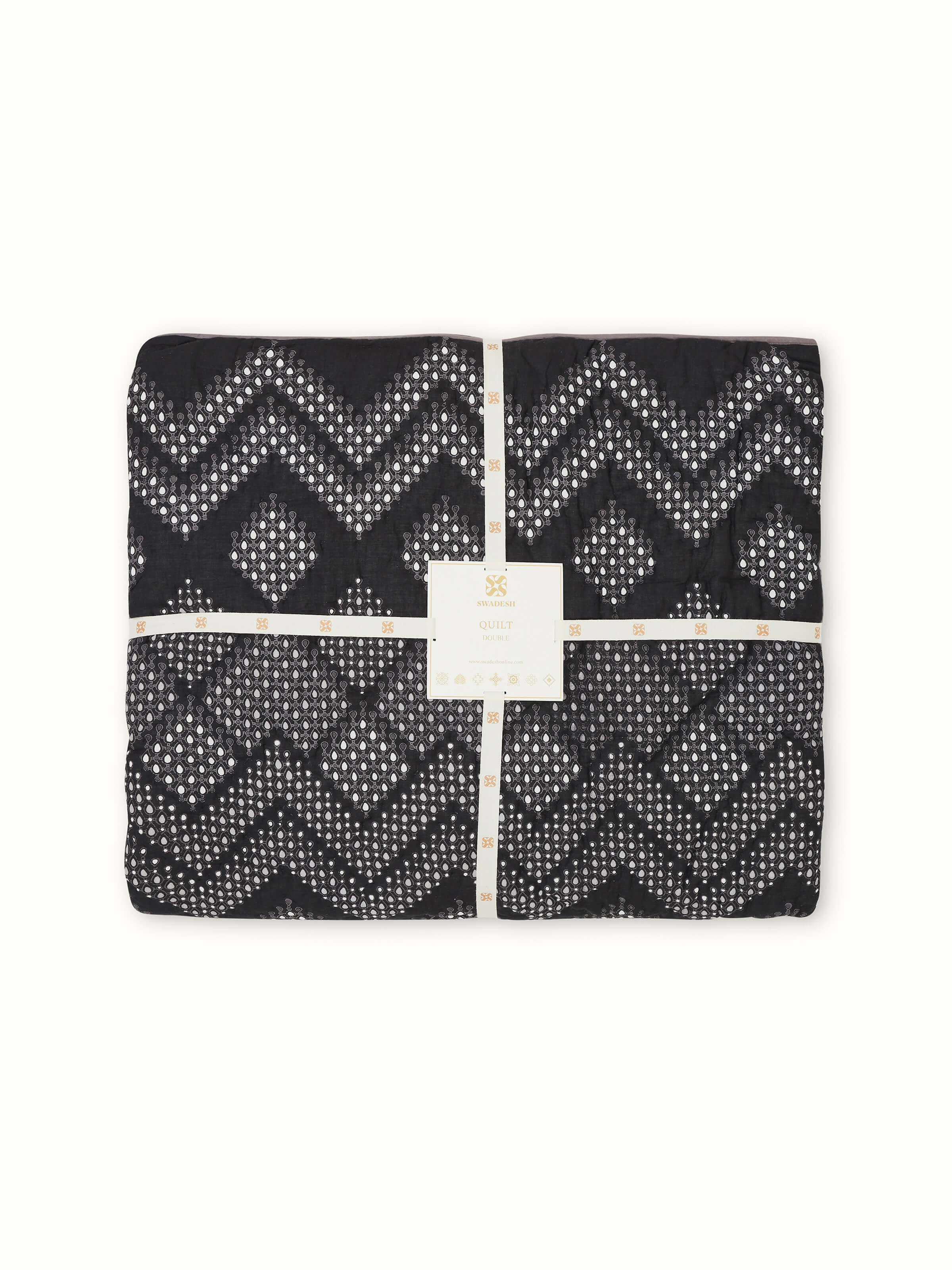 Angle view of Rambagh Grey Ombre Geo Cotton Sanganeri Block Printed Double Quilt displaying its gradient effect and design.