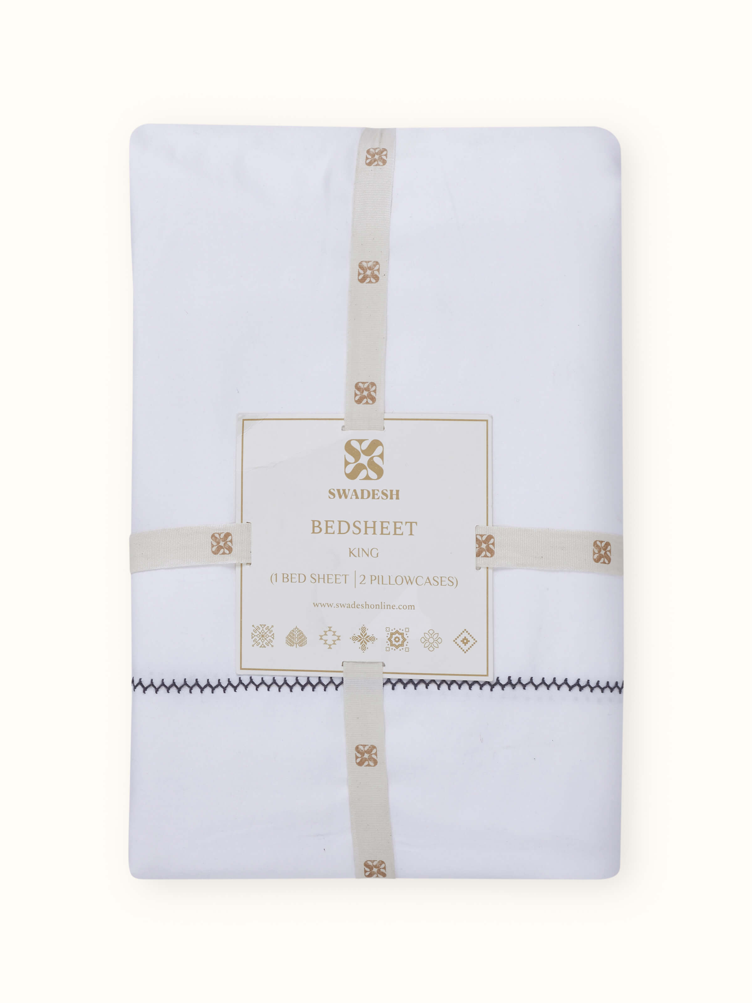 Close-up of Rambagh grey stripe cotton hand embroidered bedsheet king set, emphasizing the fine details of the embroidery and stripes.