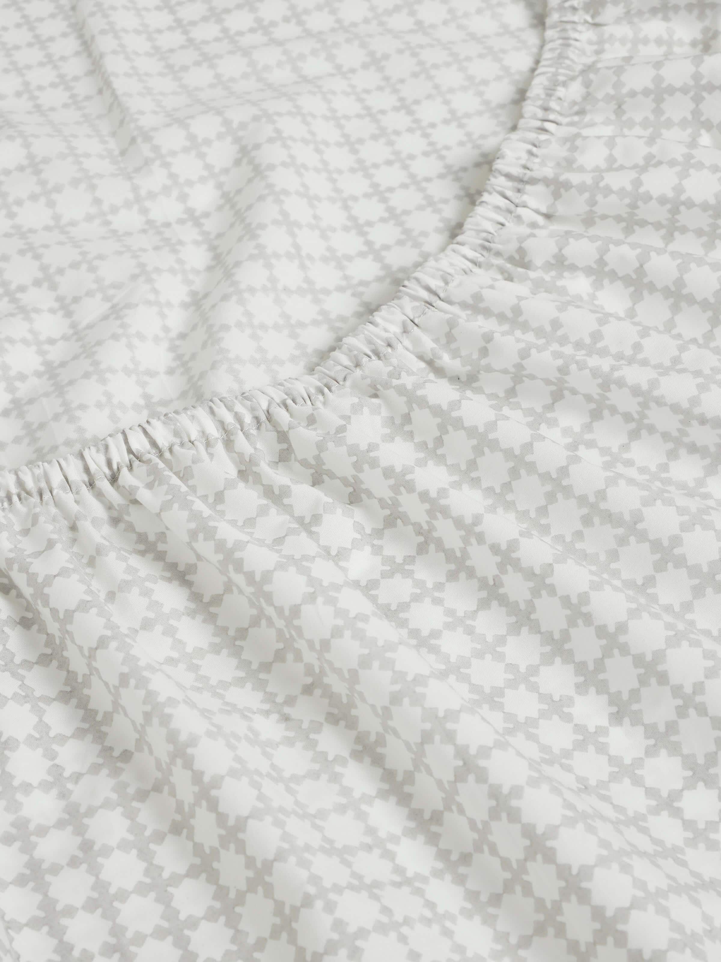 Detailed view of Pratidin grey grid cotton Sanganeri block printed queen fitted bedsheet set emphasizing the grid design and quality.