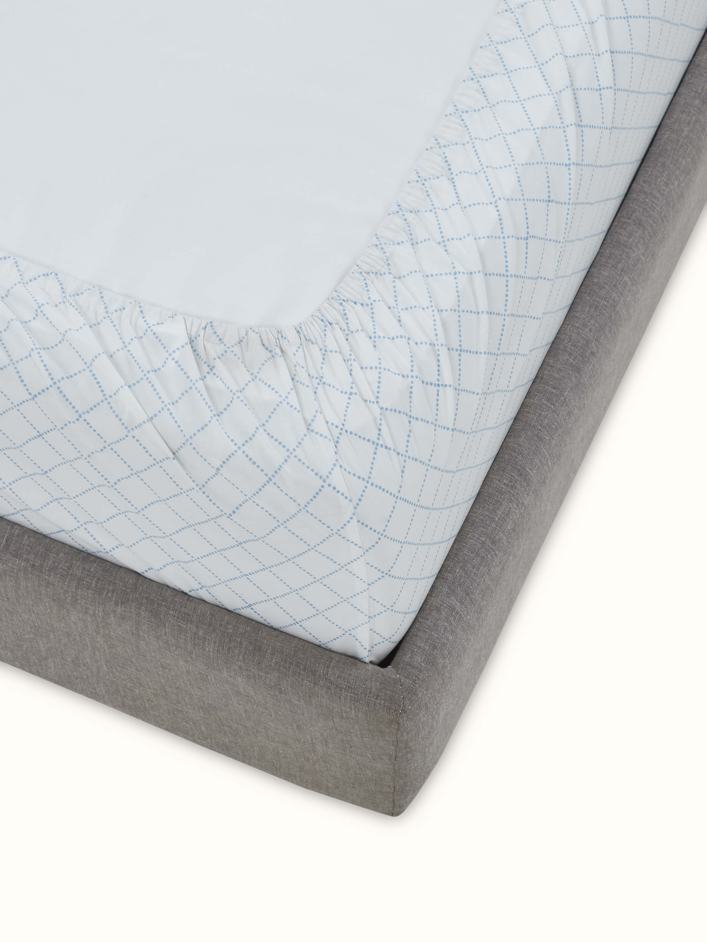 Detailed view of Pratidin Light Blue Diamond Cotton Sanganeri Block Printed King Fitted Bedsheet Set, emphasizing the fabric and design.