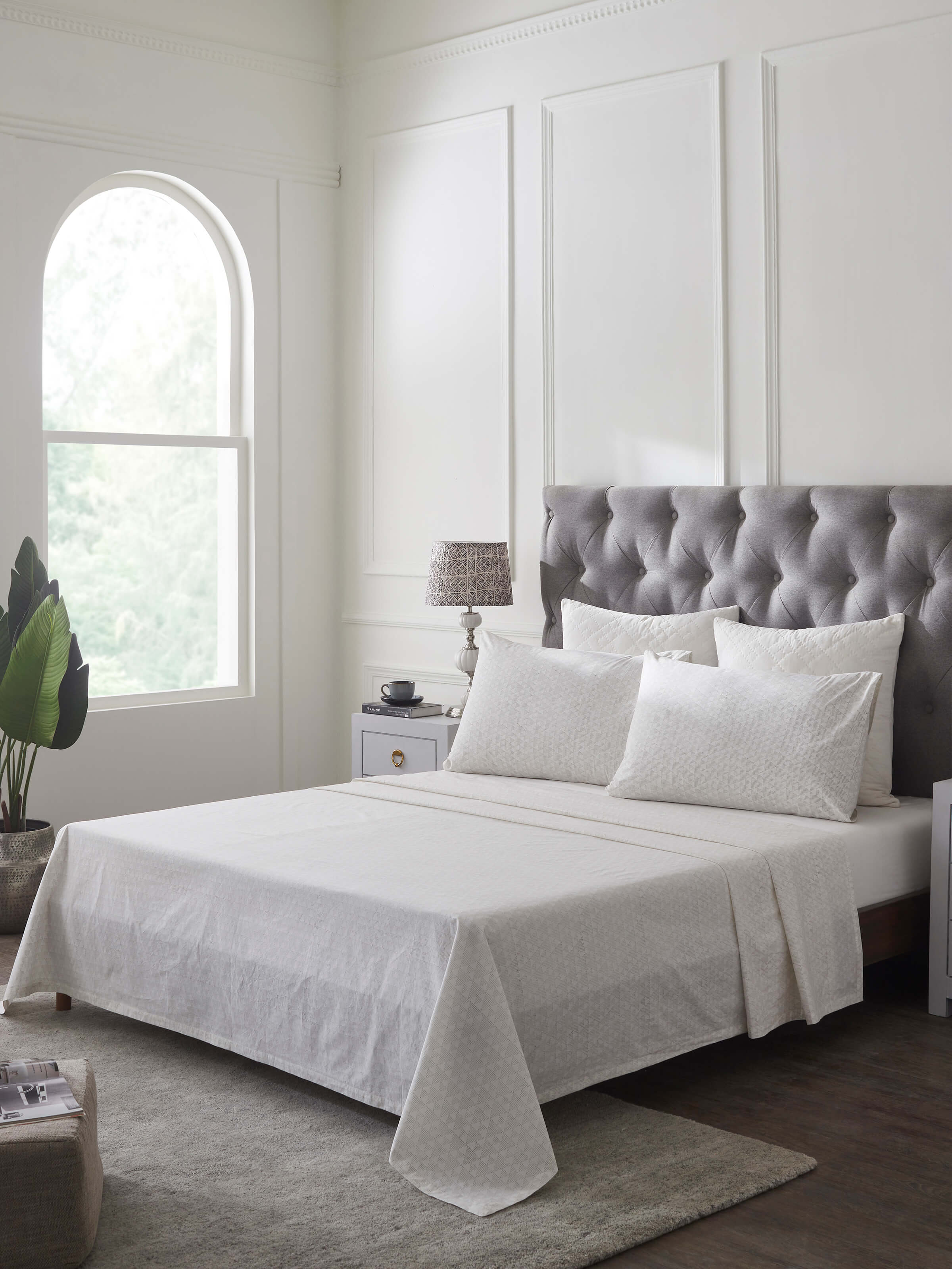 Side view of Pratidin Beige Geometric Cotton Sanganeri Block Printed Queen Bedsheet Set (3 pcs) highlighting the geometric pattern and fabric.