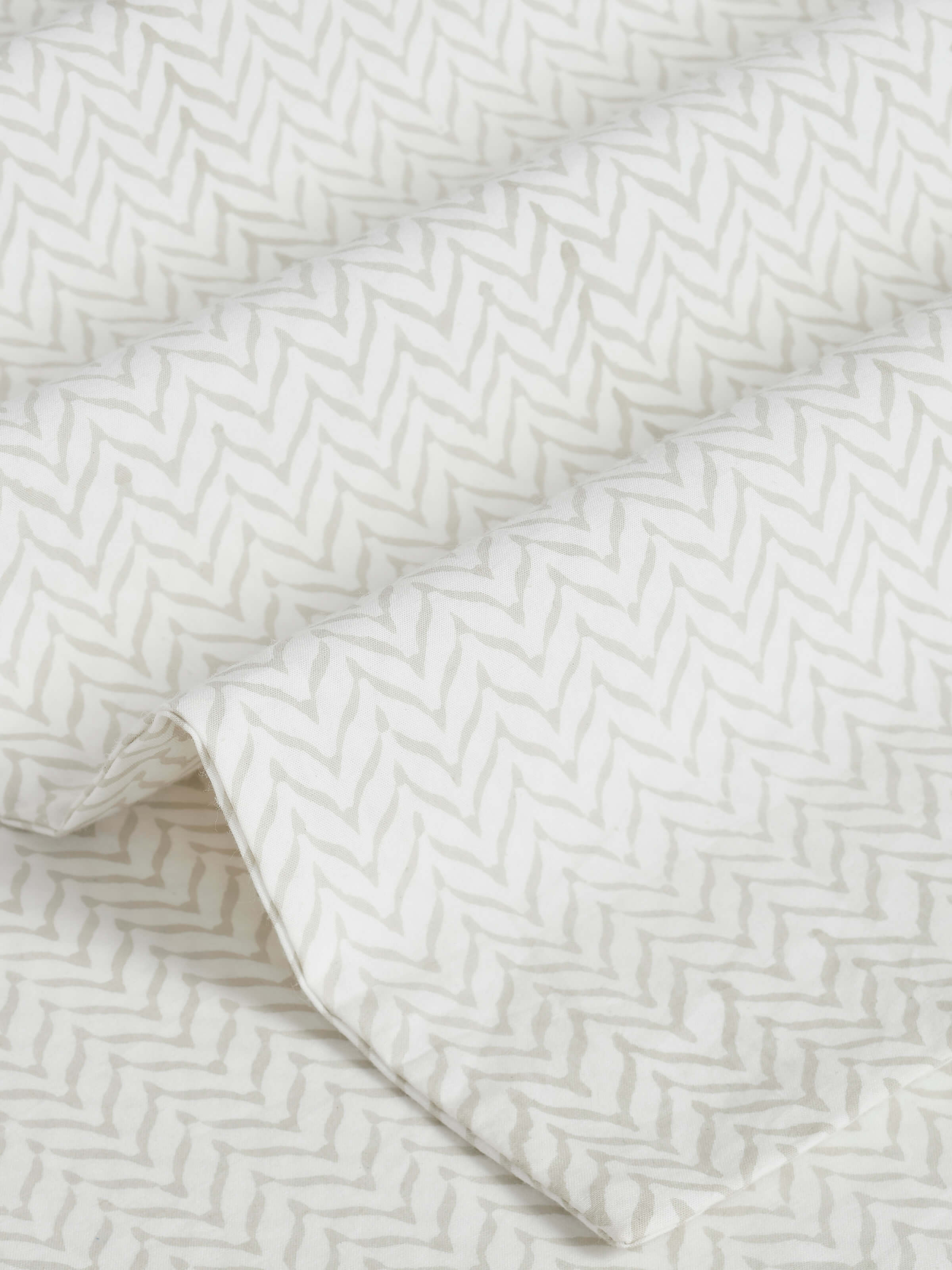 Top view of Pratidin Beige Chevron Cotton Sanganeri Block Printed King Bedsheet Set (3 pcs) with full bedsheet layout