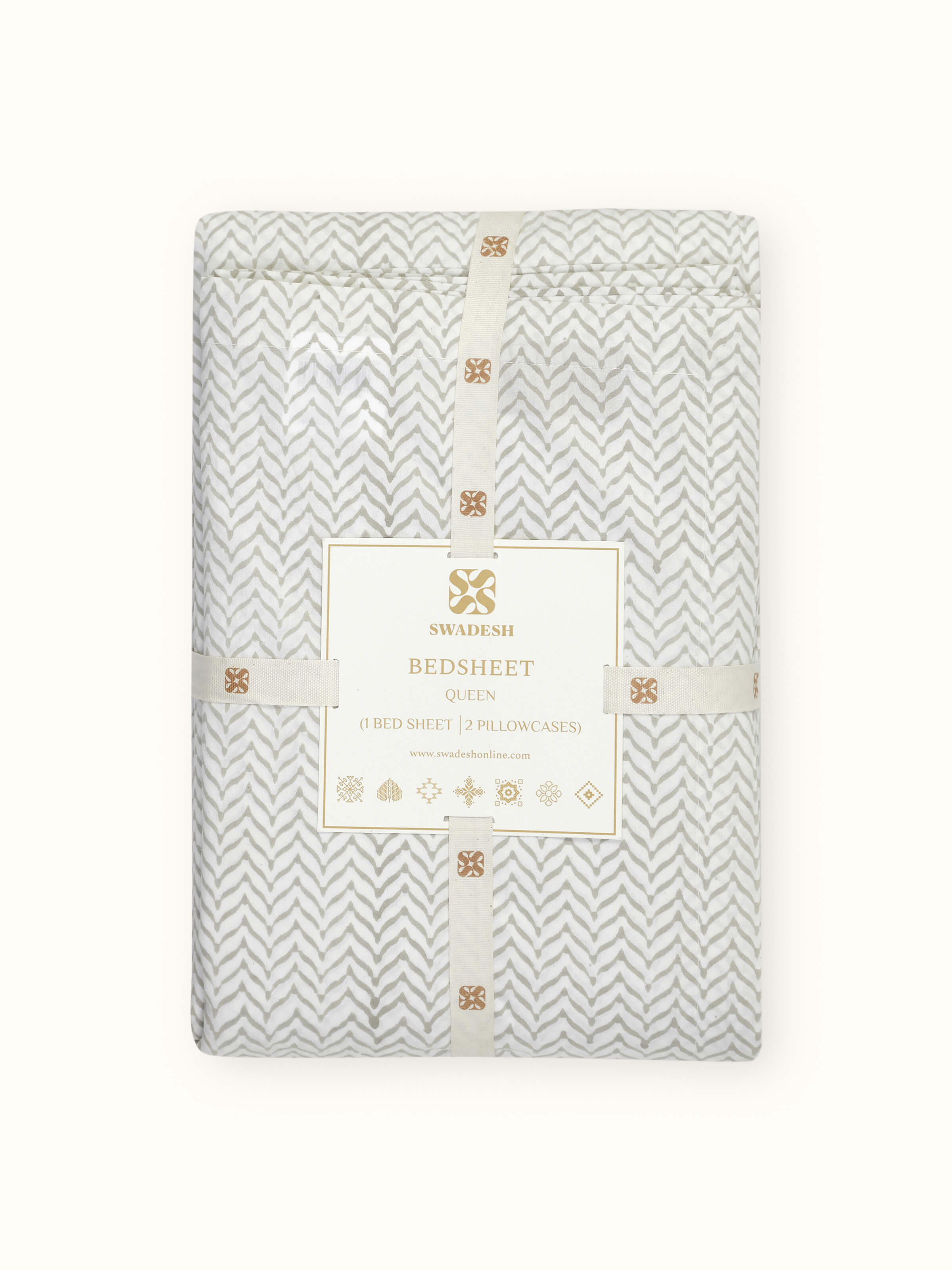 Angle view of Pratidin Beige Chevron Cotton Sanganeri Block Printed Queen Bedsheet Set, showcasing the complete bedding arrangement.