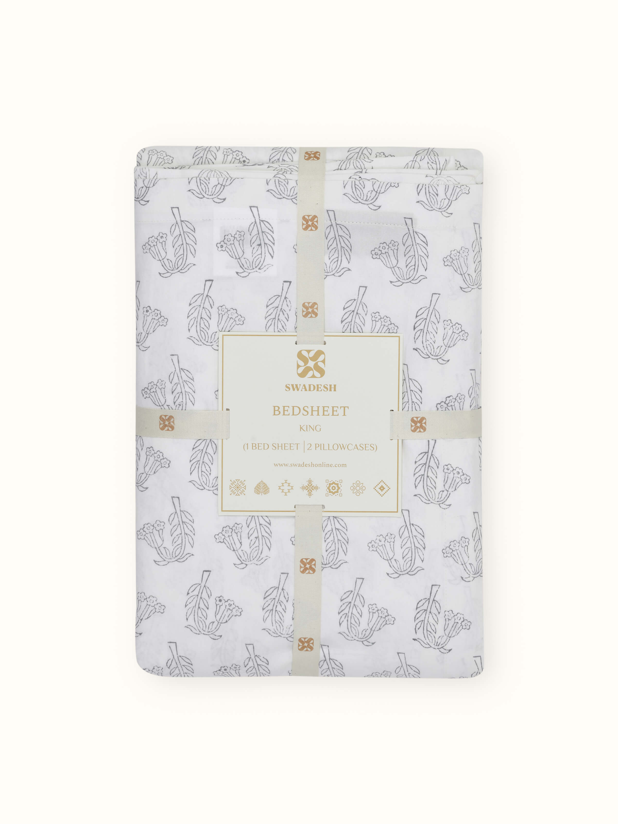 Angled view of Pratidin Grey Floral Sprig Cotton Sanganeri Block Printed King Bedsheet, showcasing the entire bedsheet set with pillows.