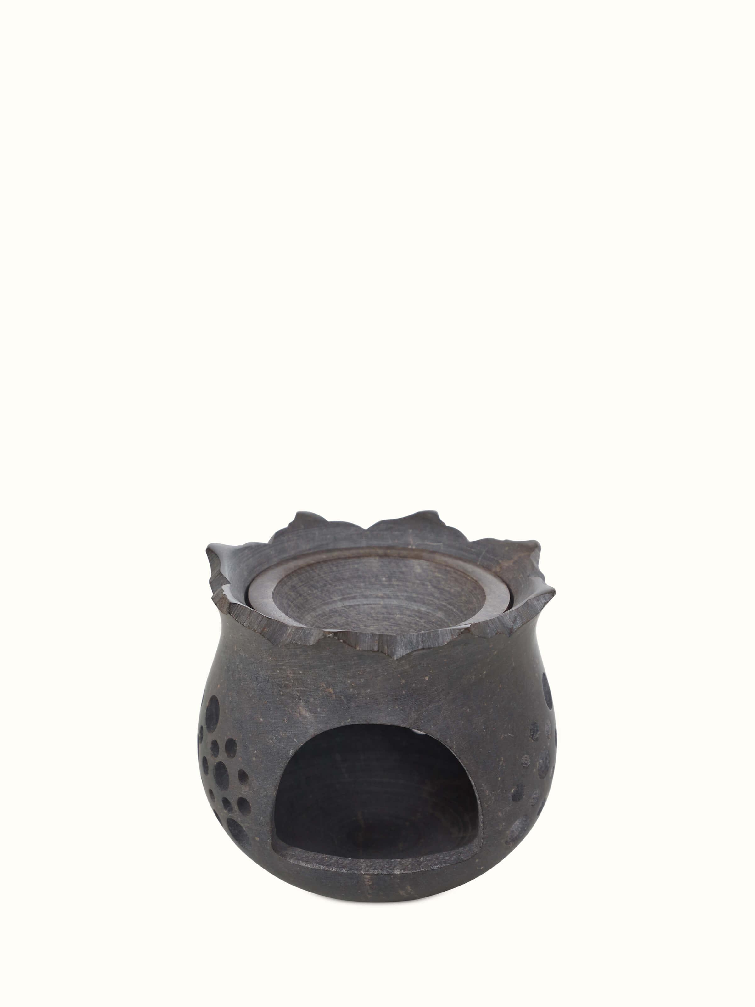 Angle view of hand-carved stone diffuser.