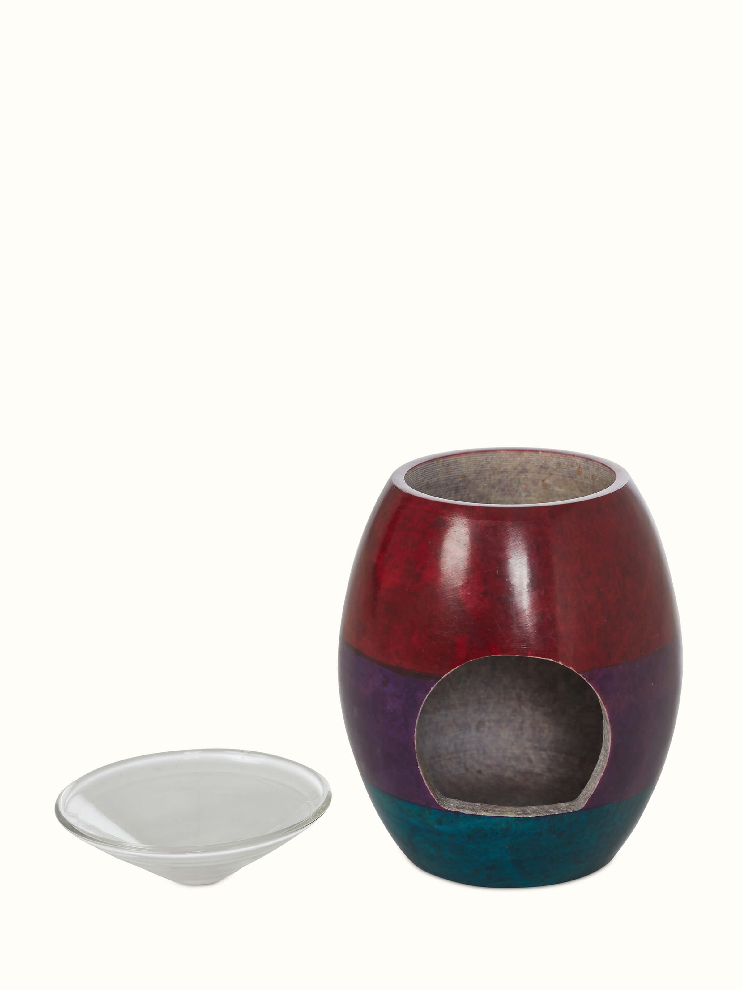 Detailed view of Carved stone diffuser in multicolor focusing on carving details