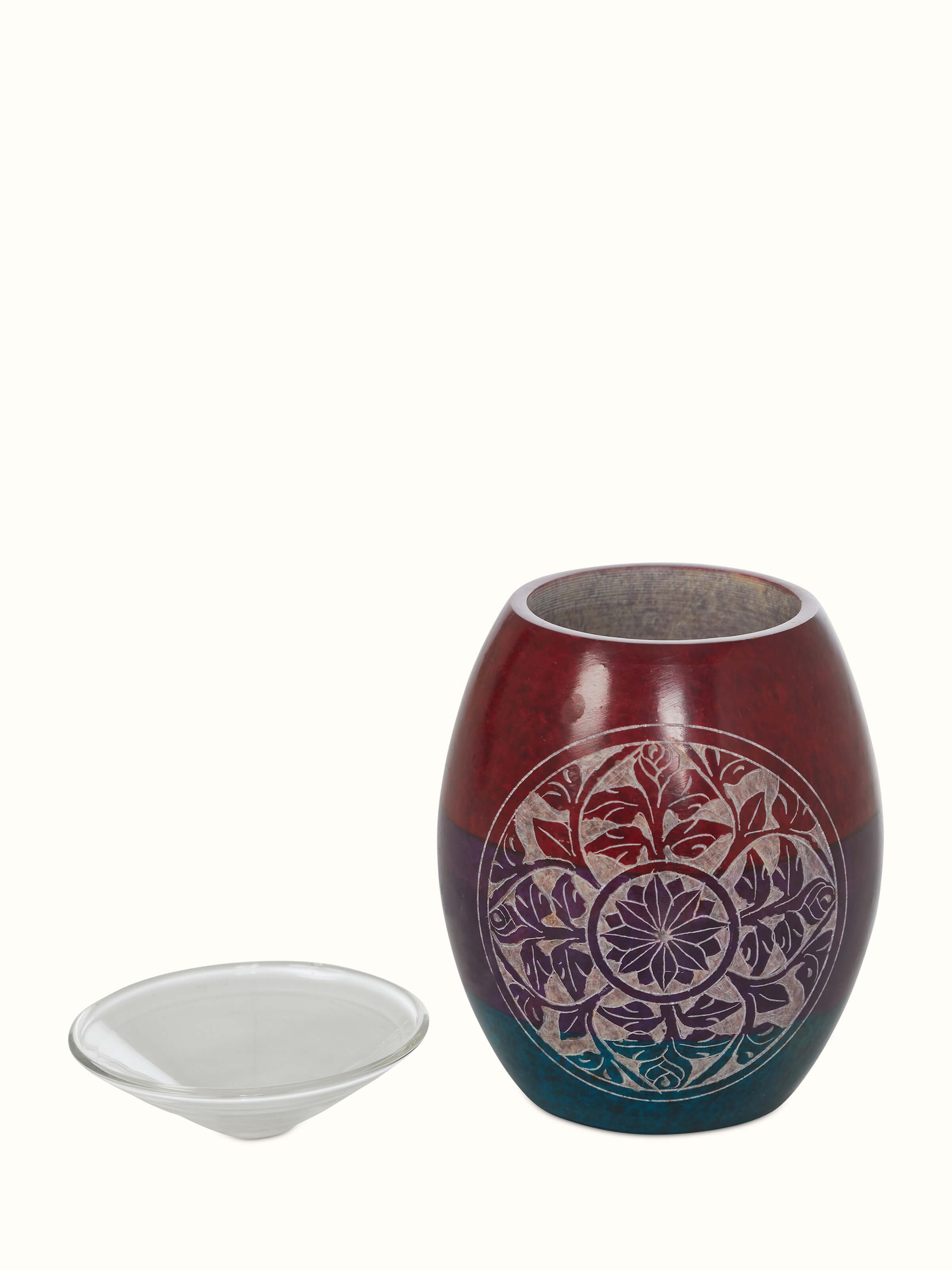 Angled view of Carved stone diffuser in multicolor showcasing its design