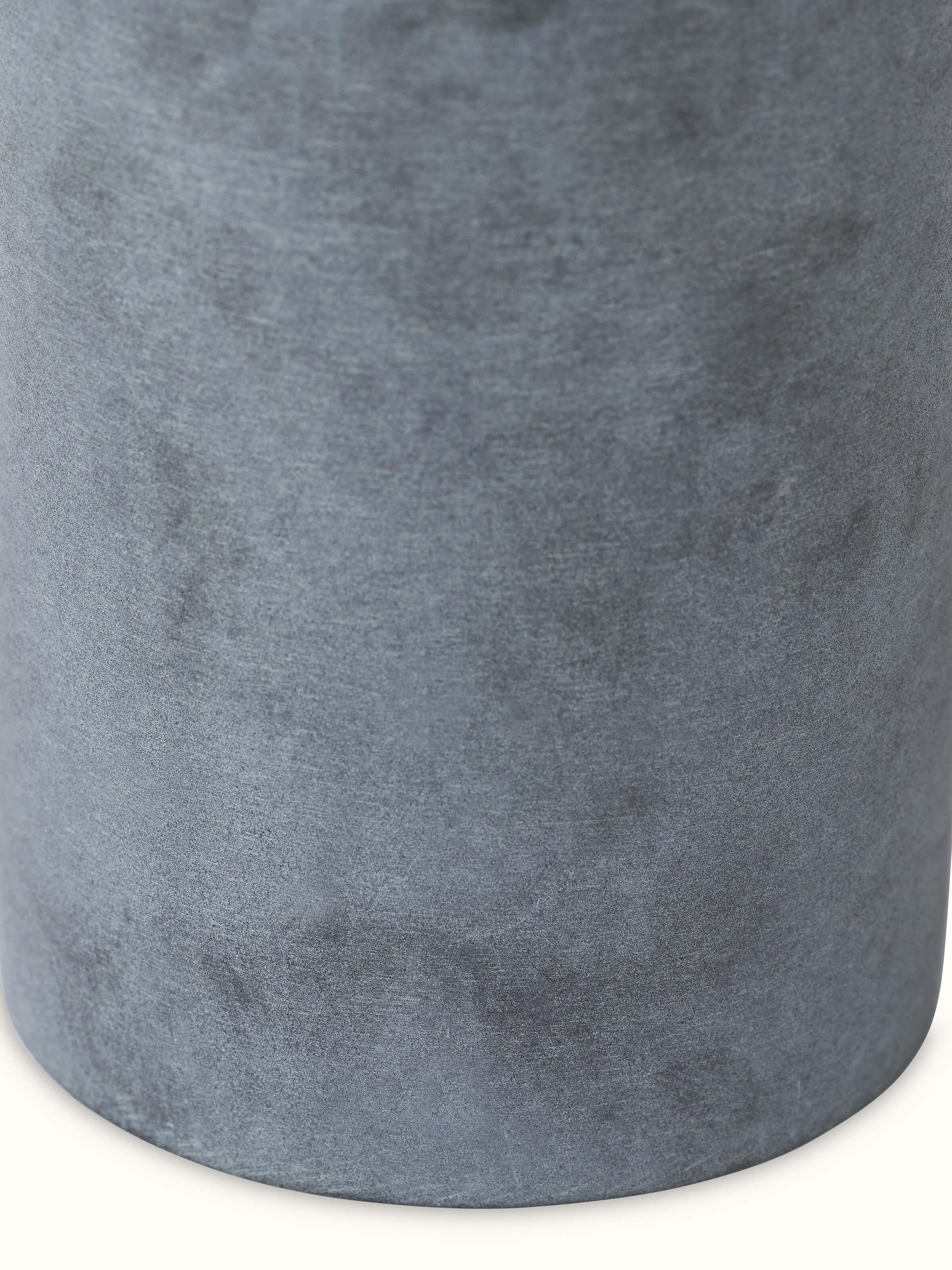 Full view of glossy carved stone soap dispenser displaying its overall design and luxurious polished appearance.