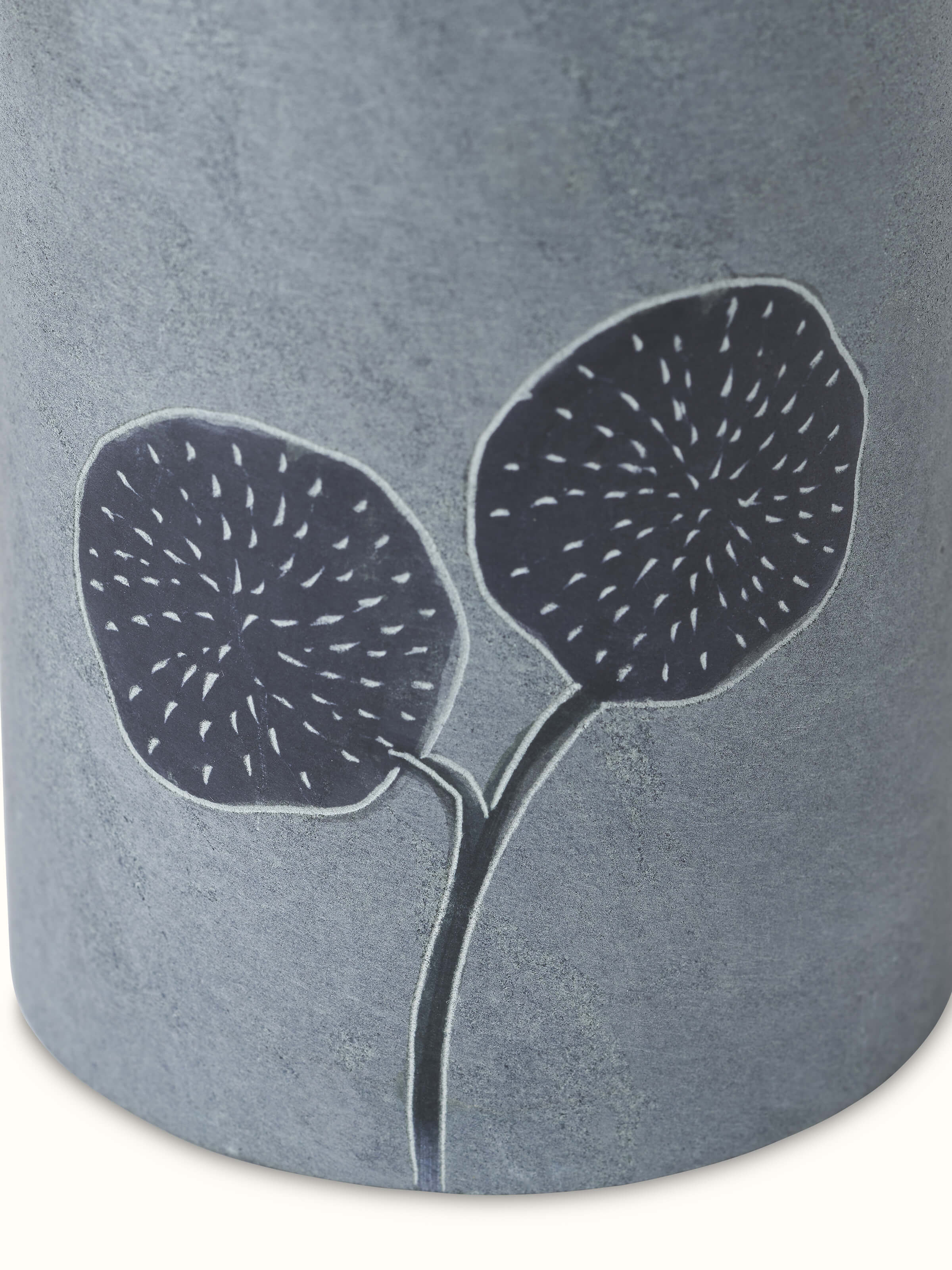 Angled view of Carved stone toothbrush holder showcasing its intricate design